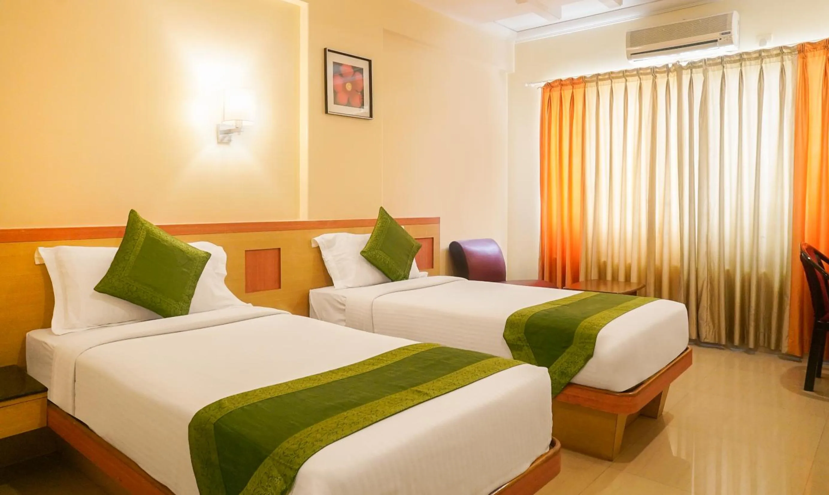 Bed in Treebo Brahma Regency