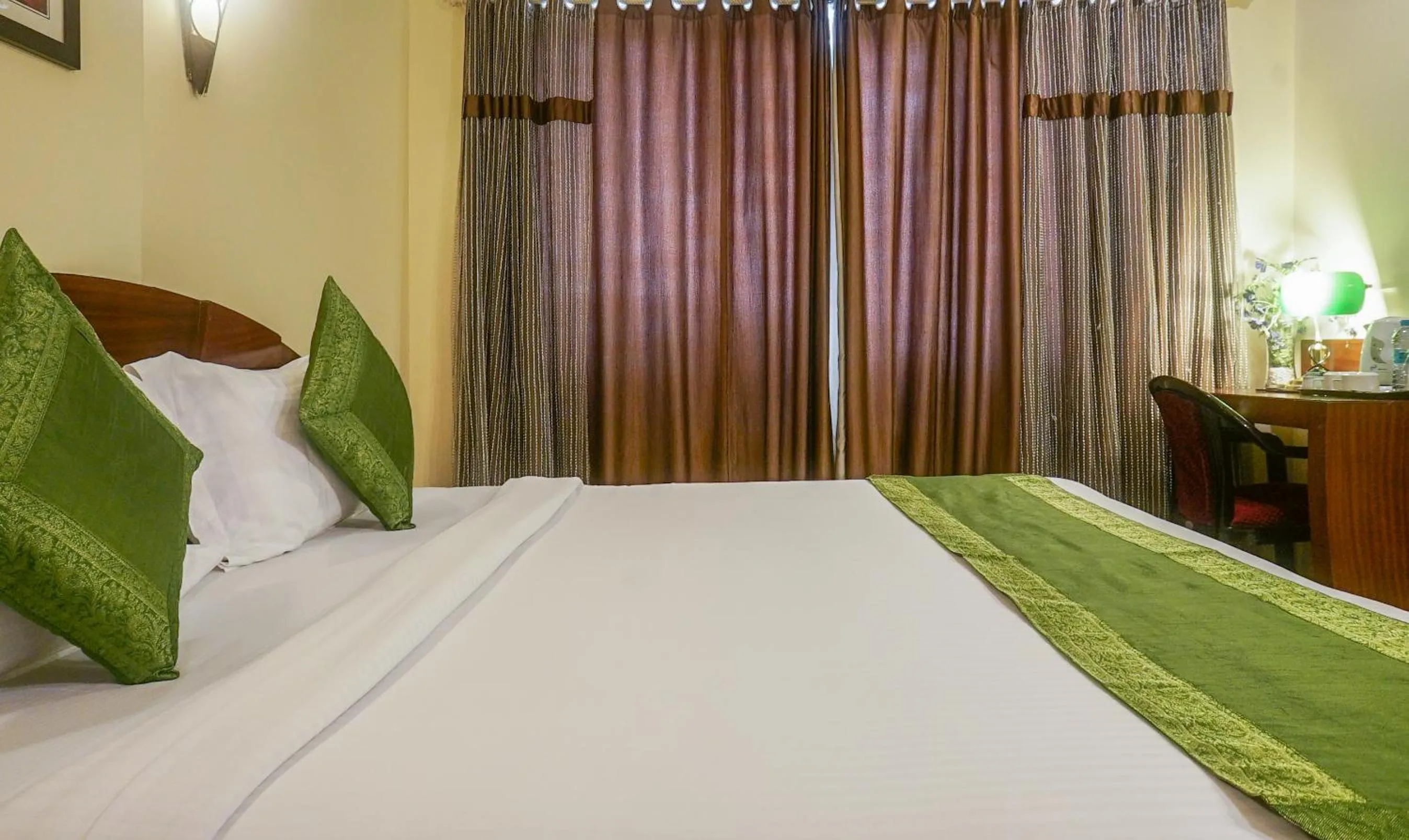 Bed in Treebo Brahma Regency