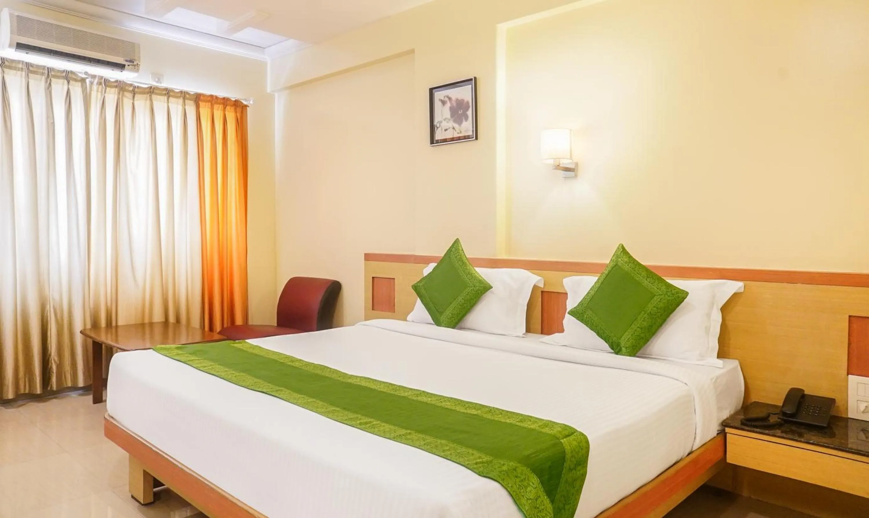 Bed in Treebo Brahma Regency