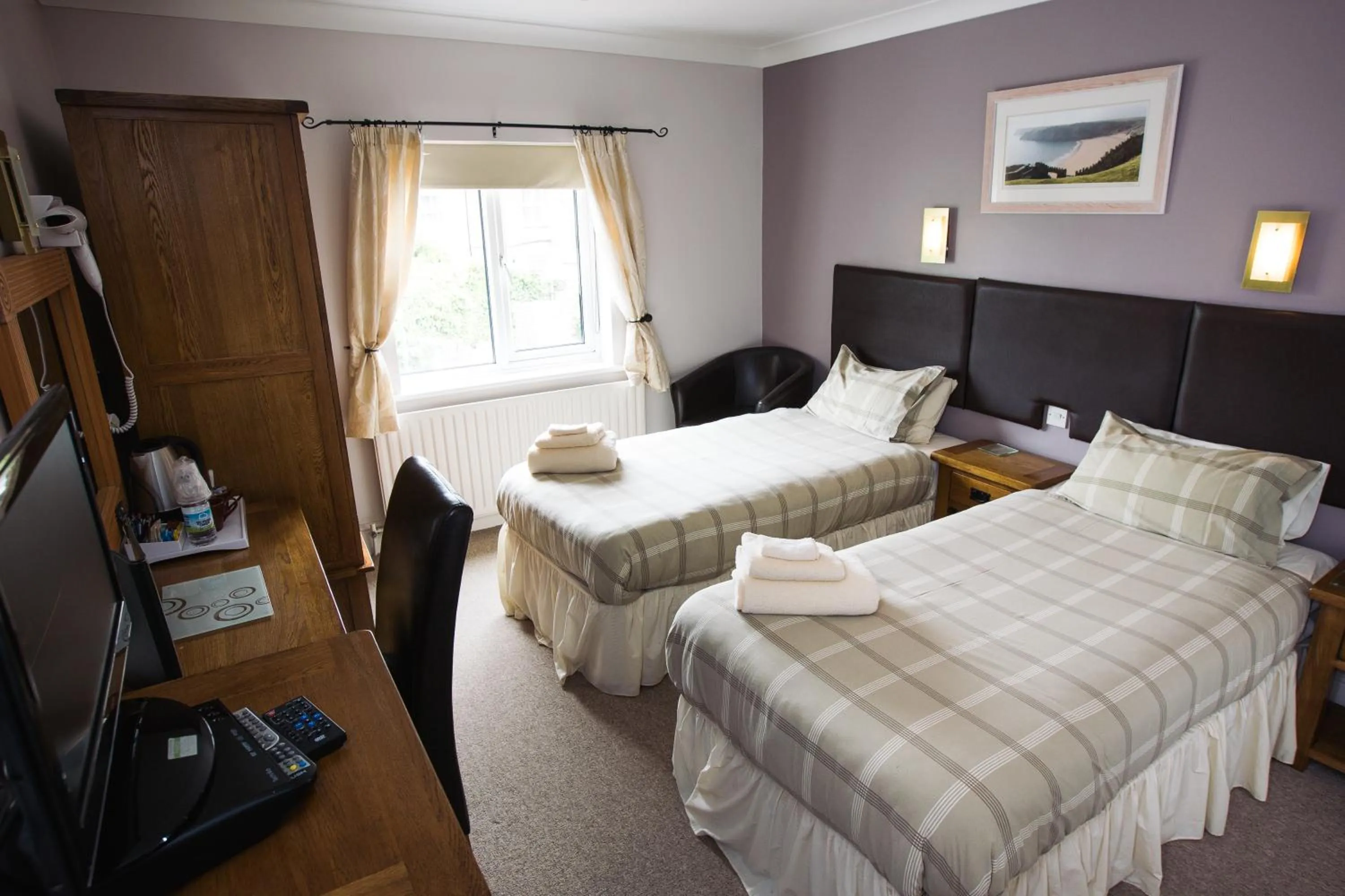 Bed in The Coach House Hotel