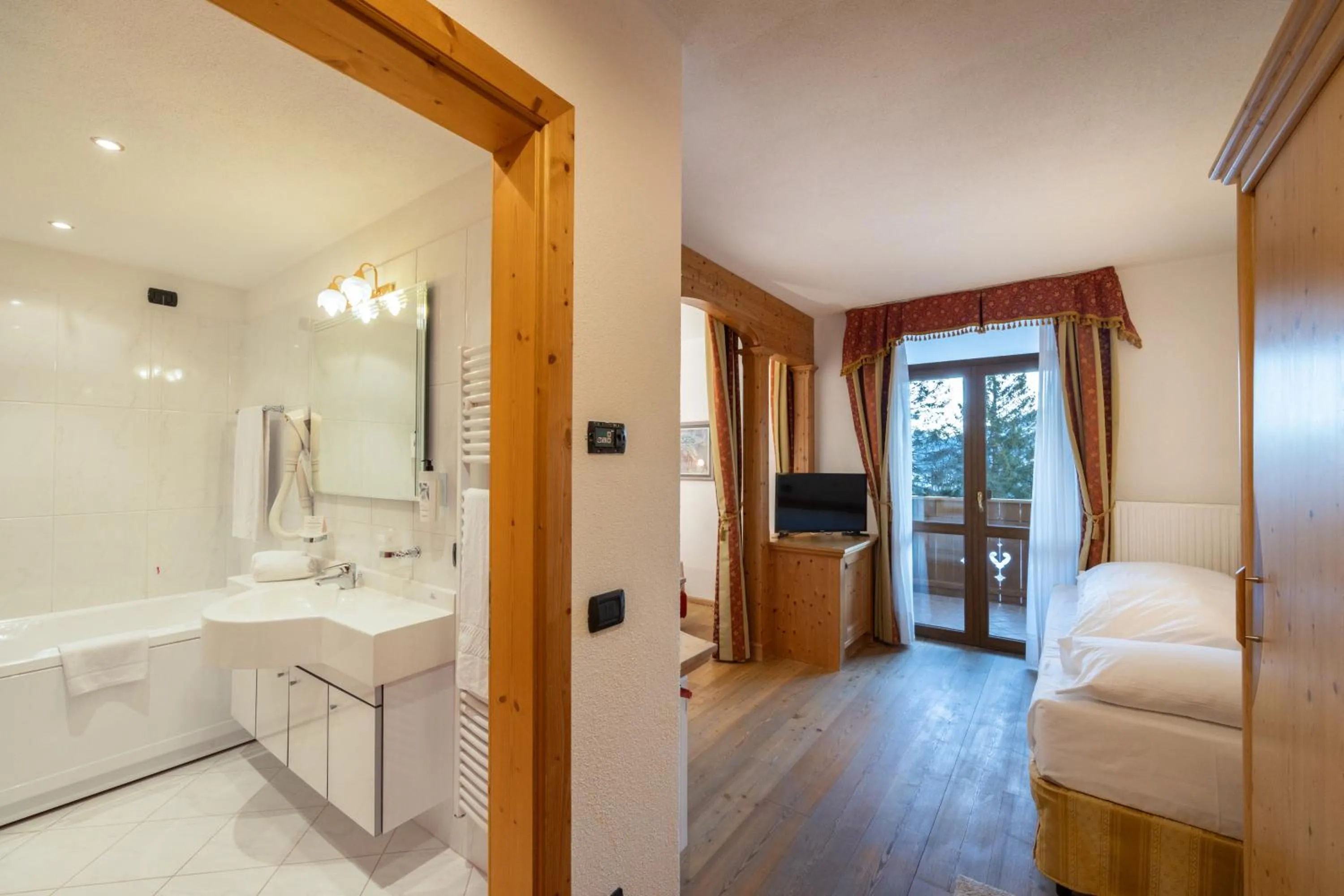 Bed in Hotel Stalon Alpine Chic