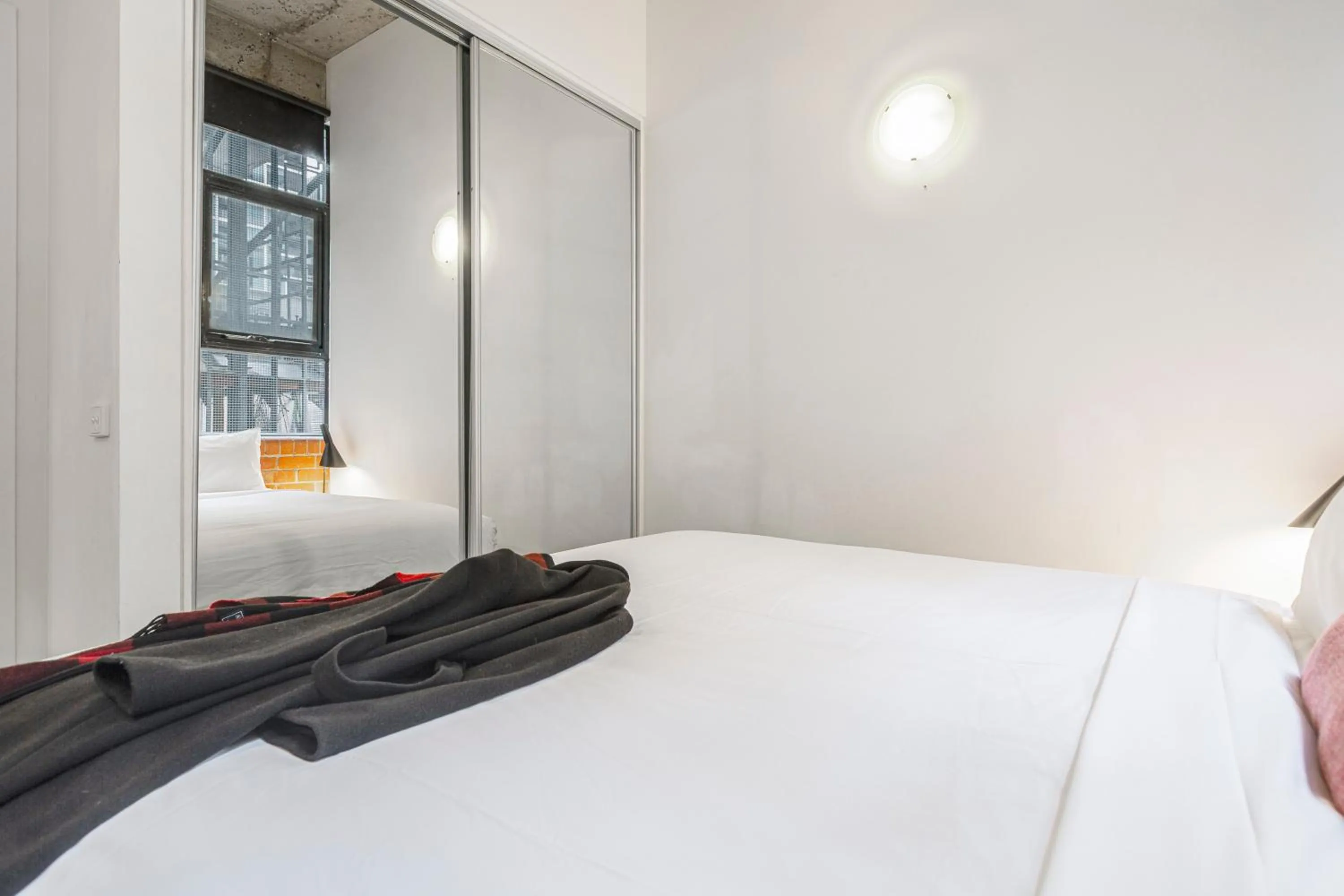 Bedroom, Bed in Punthill Apartment Hotel - Manhattan