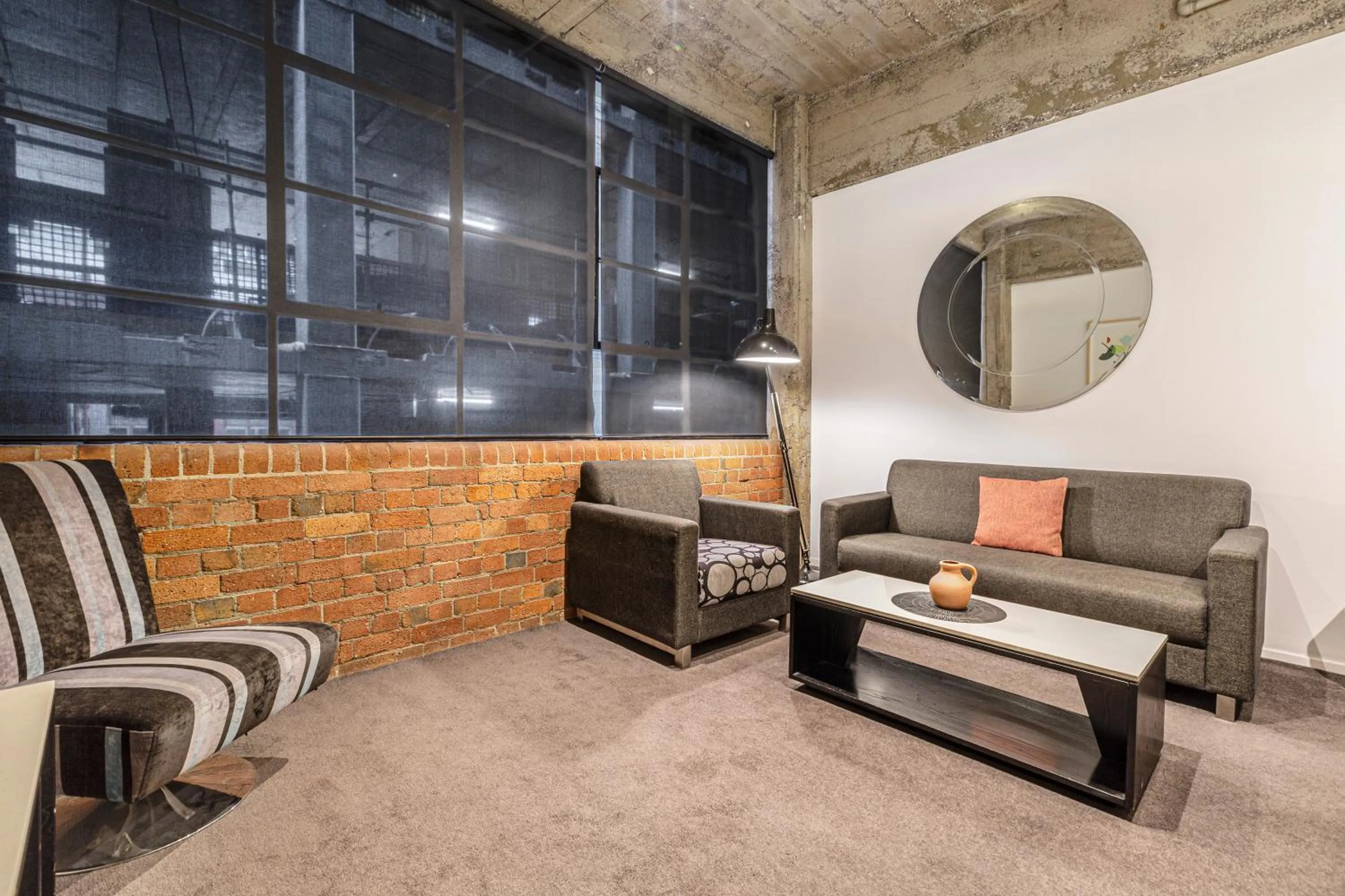 Living room in Punthill Apartment Hotel - Manhattan