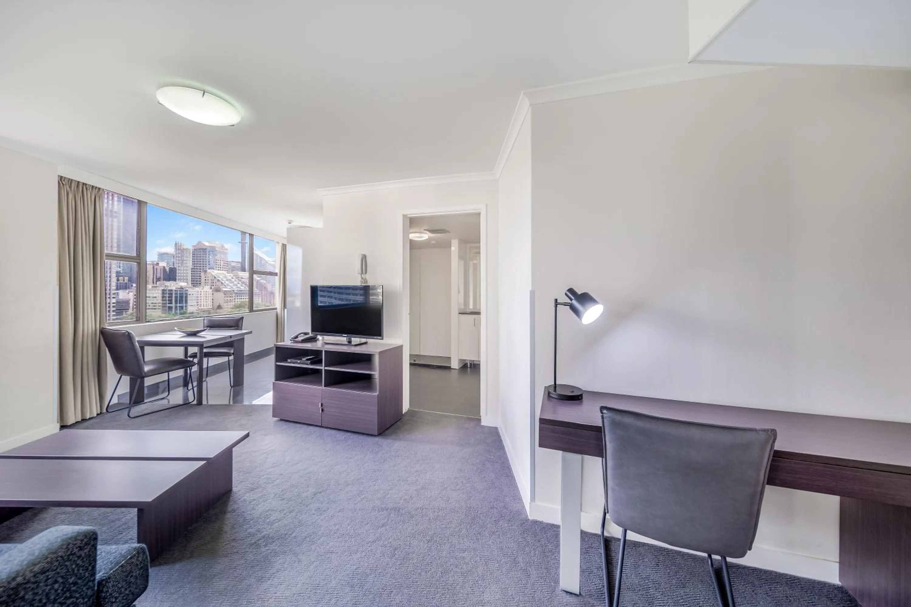 Communal lounge/ TV room in Oaks Sydney Hyde Park Suites