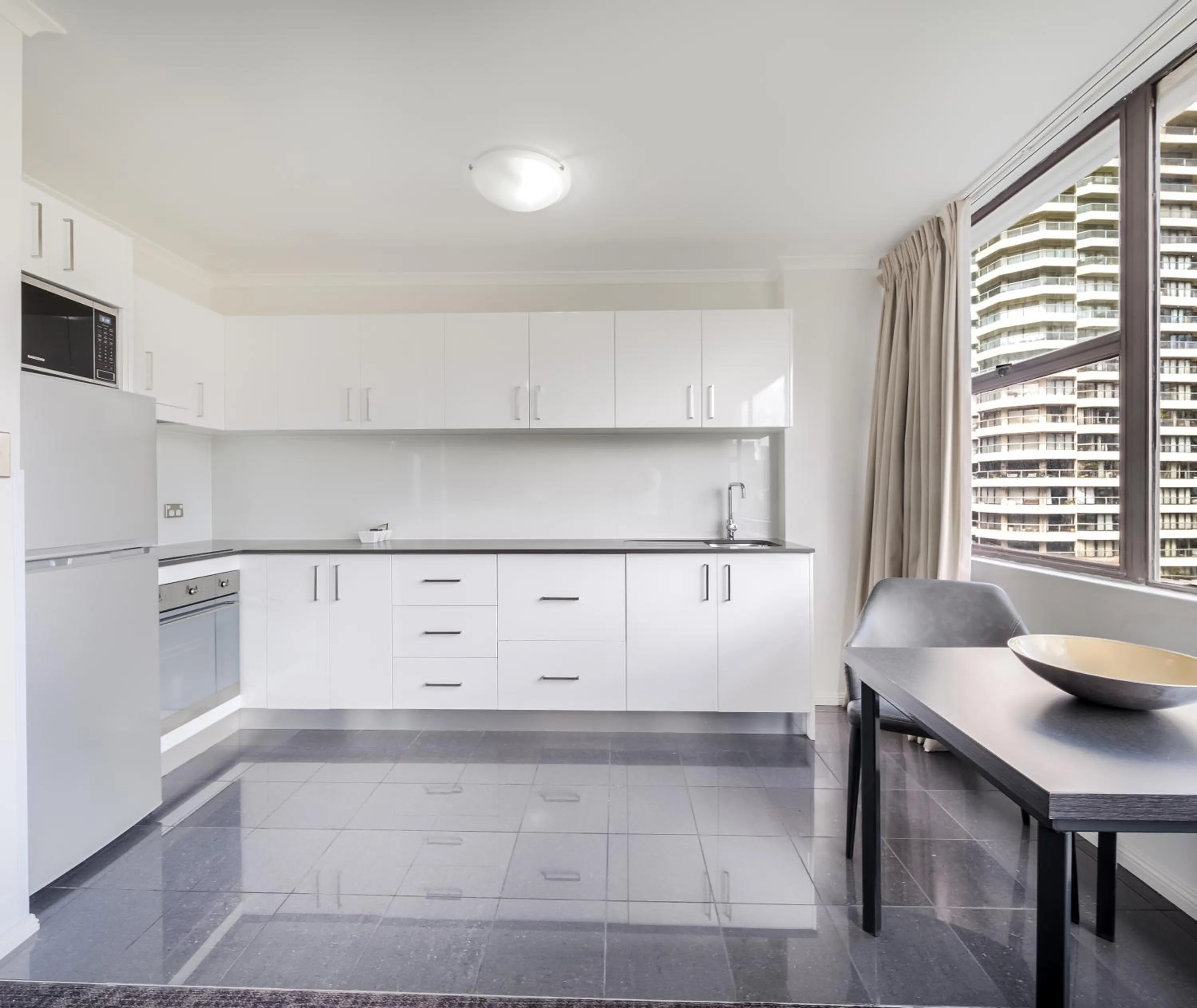 kitchen in Oaks Sydney Hyde Park Suites