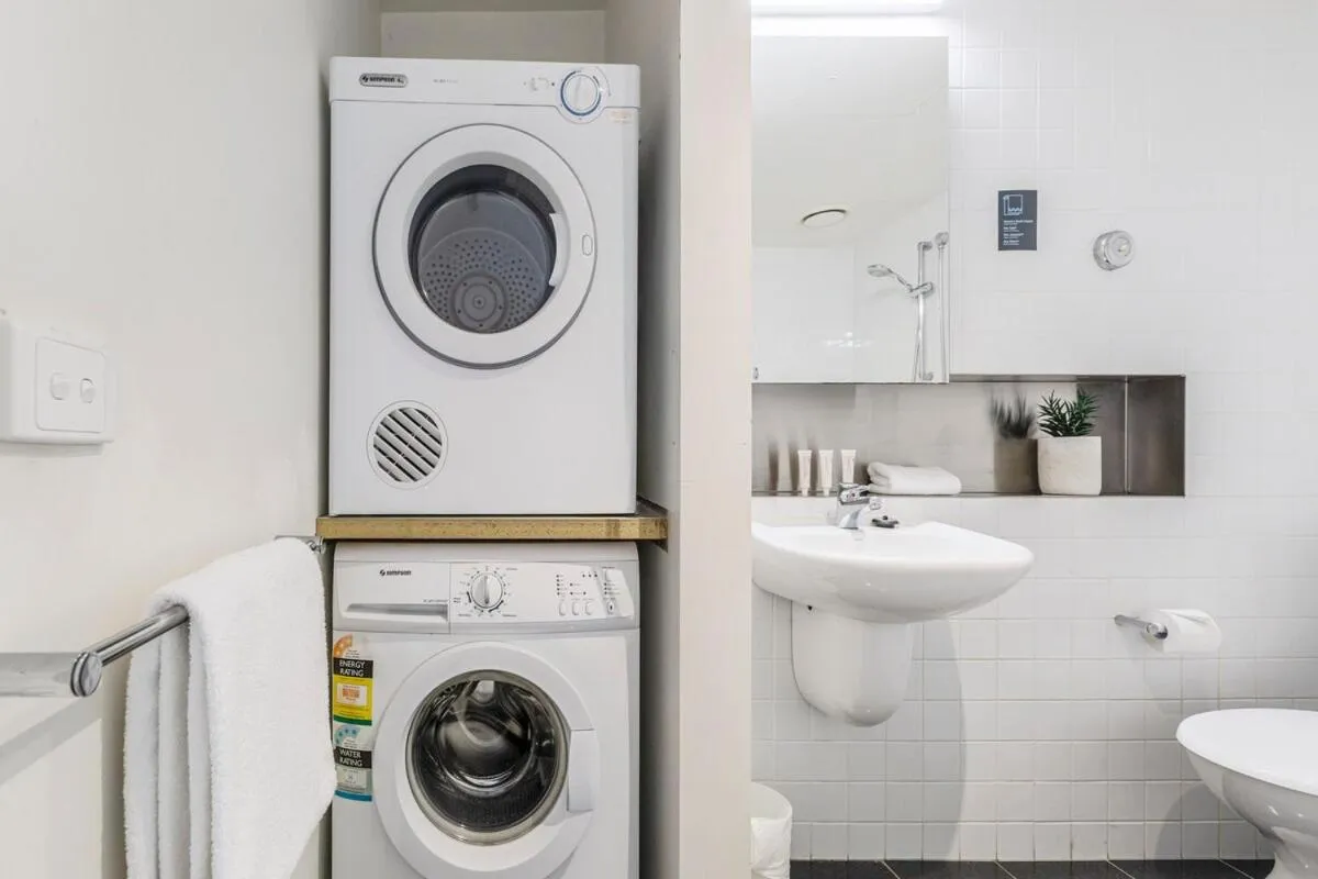 washing machine in Punthill Apartment Hotel - Little Bourke