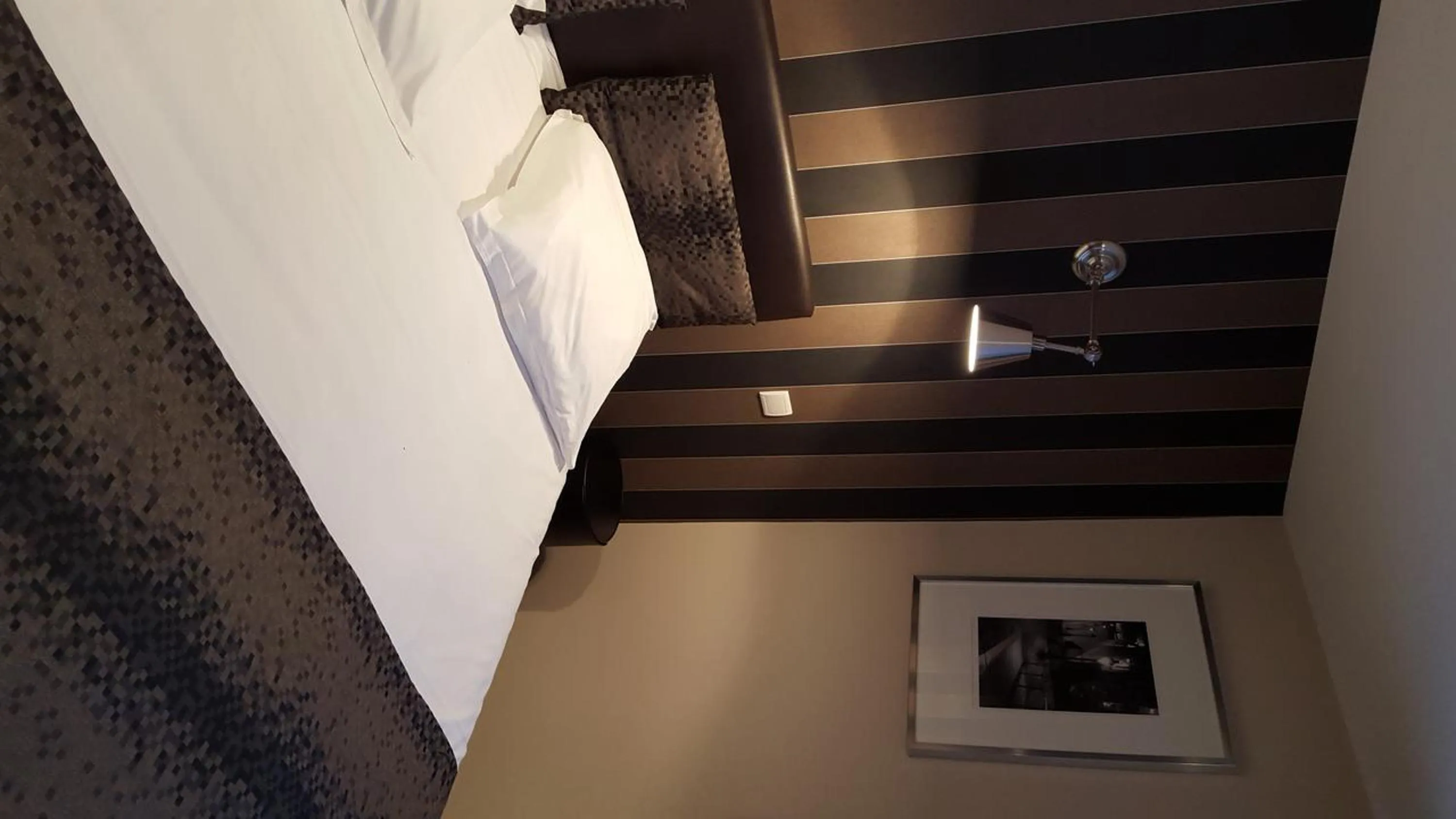 Photo of the whole room in Logis Hotel Les Sapins