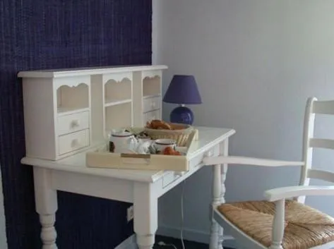 Seating area in Logis Hotel Les Sapins