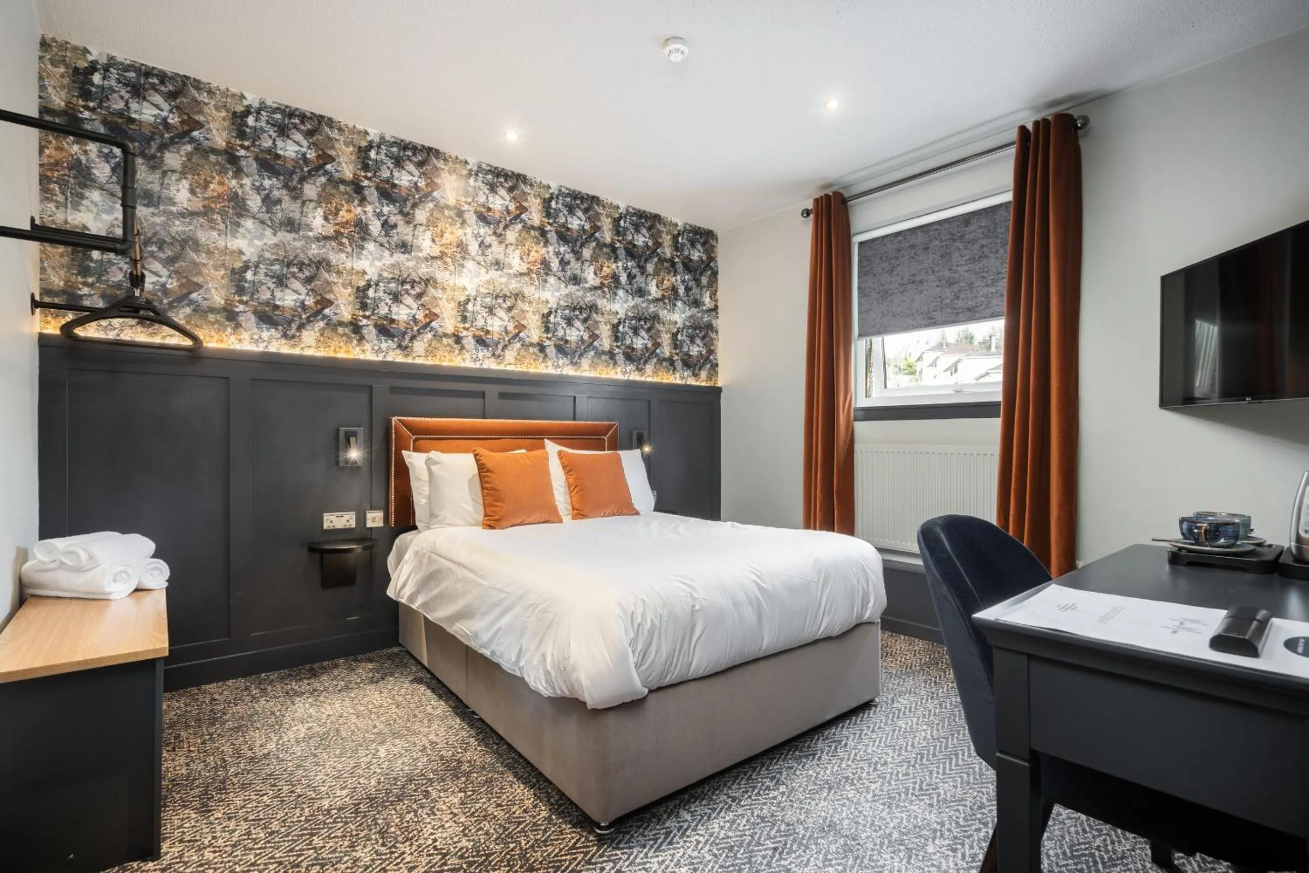 Bed in The Coachman Hotel