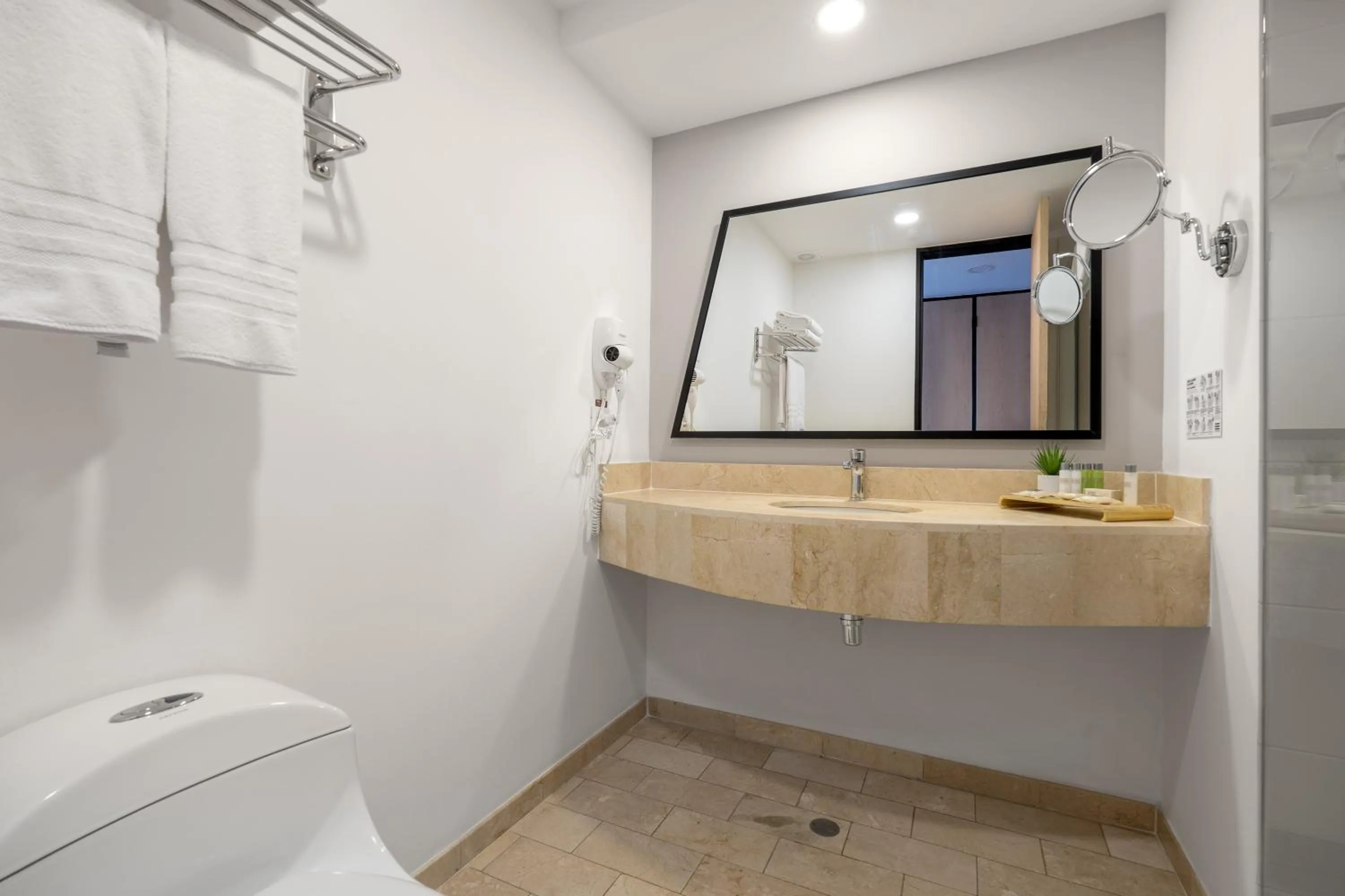 Bathroom in Novelty Suites Hotel - Oviedo Mall