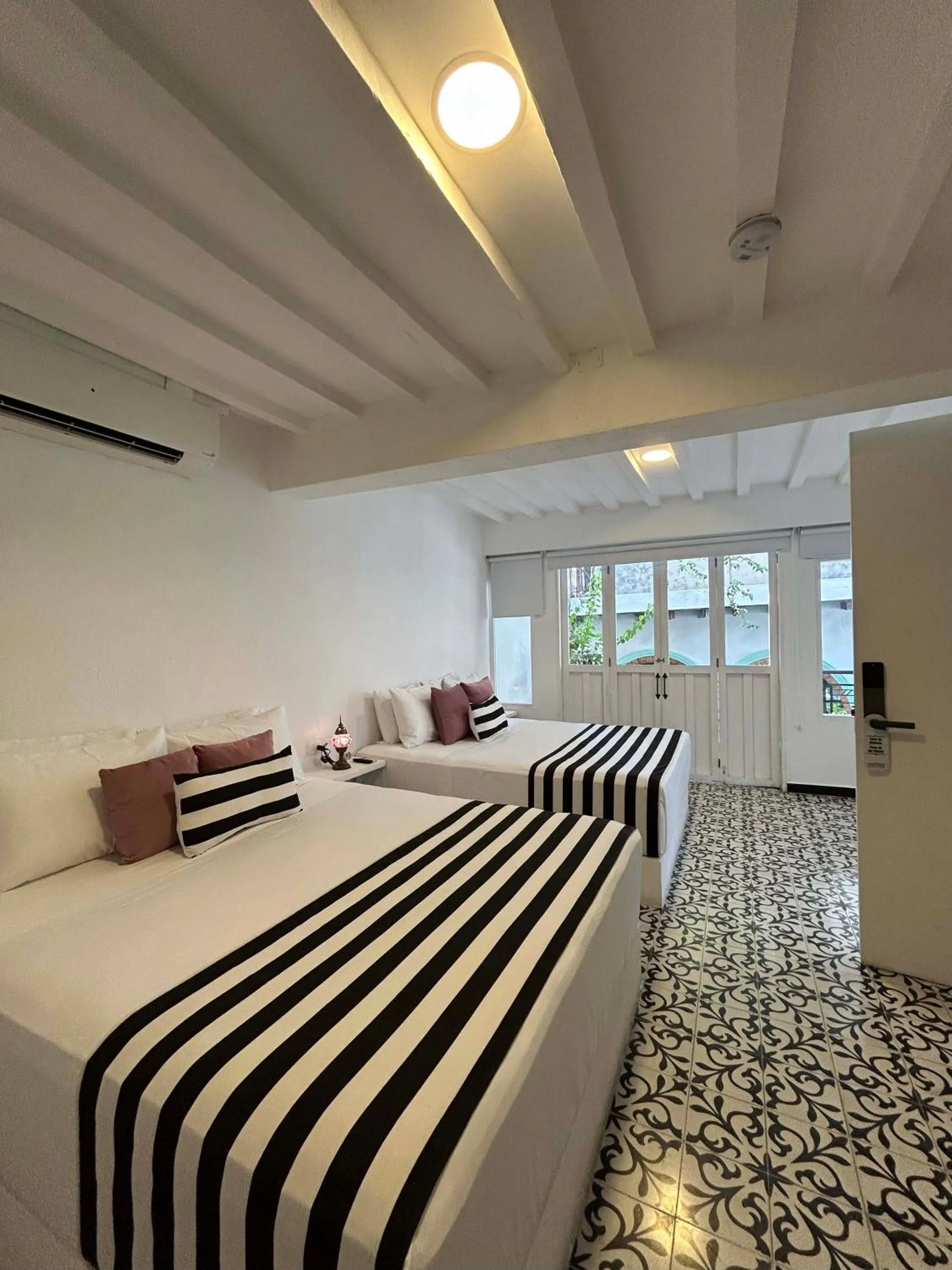 Bed in Casa Verde Boutique Hotel