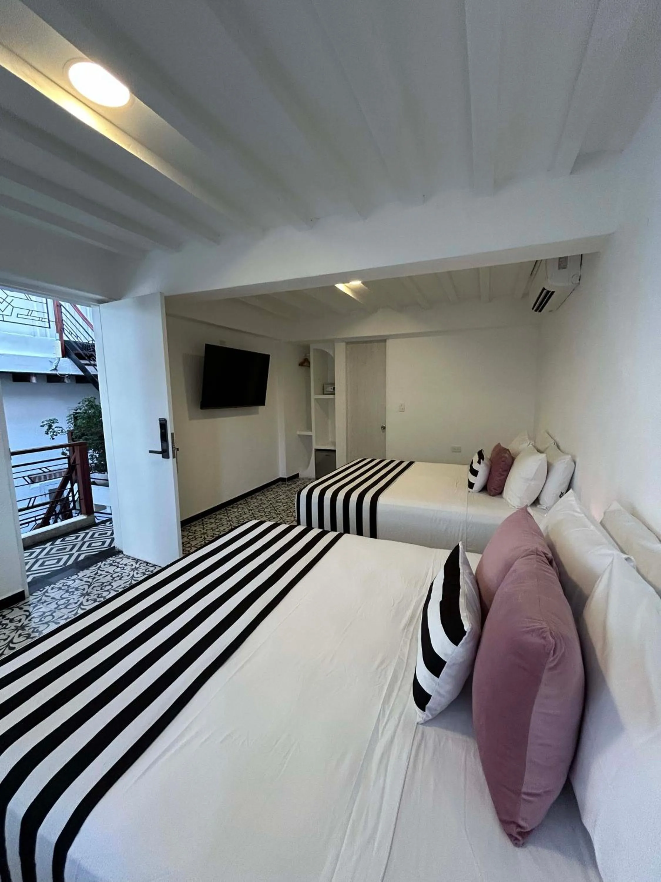 Bed in Casa Verde Boutique Hotel