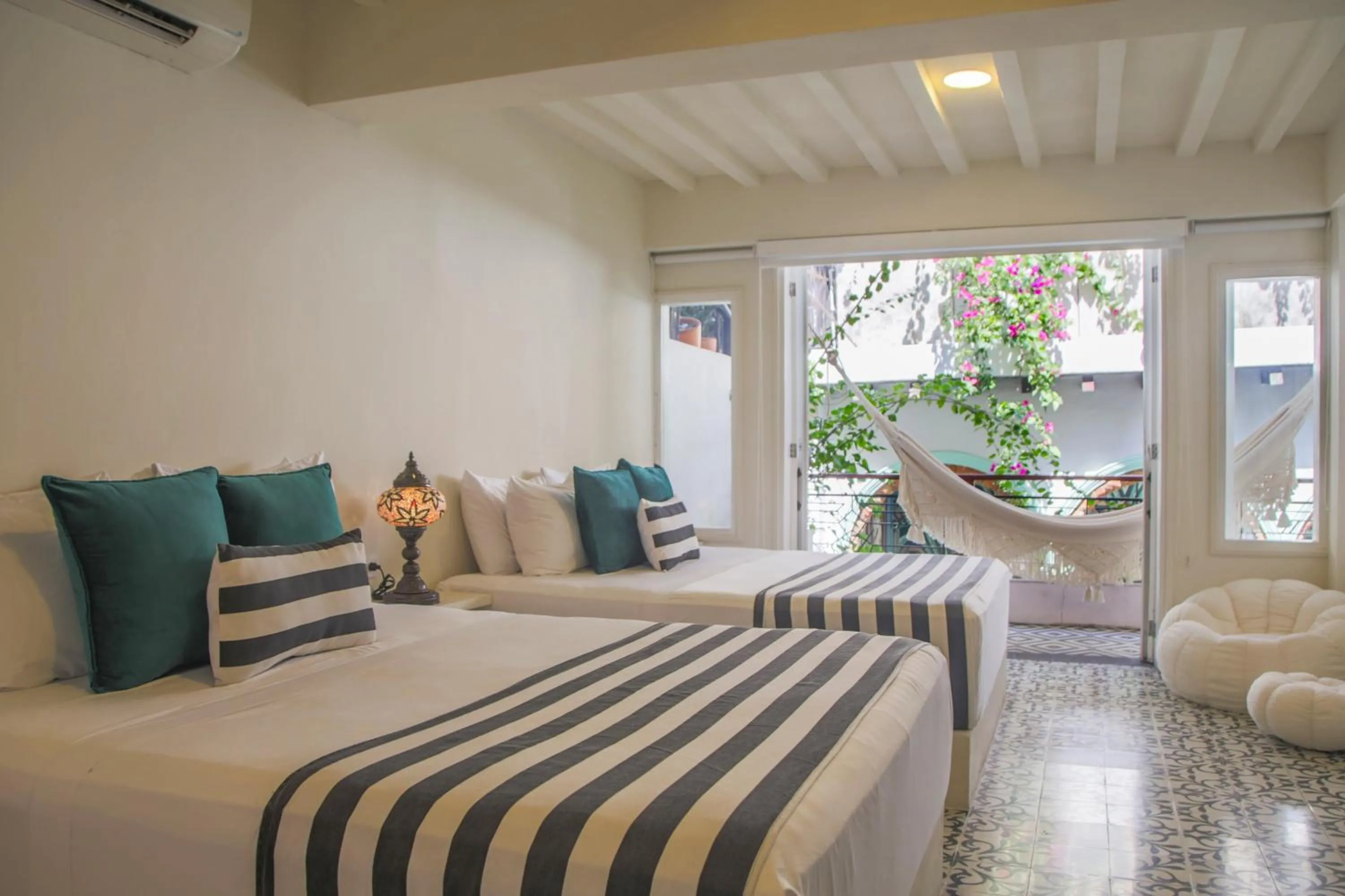 Bed in Casa Verde Boutique Hotel
