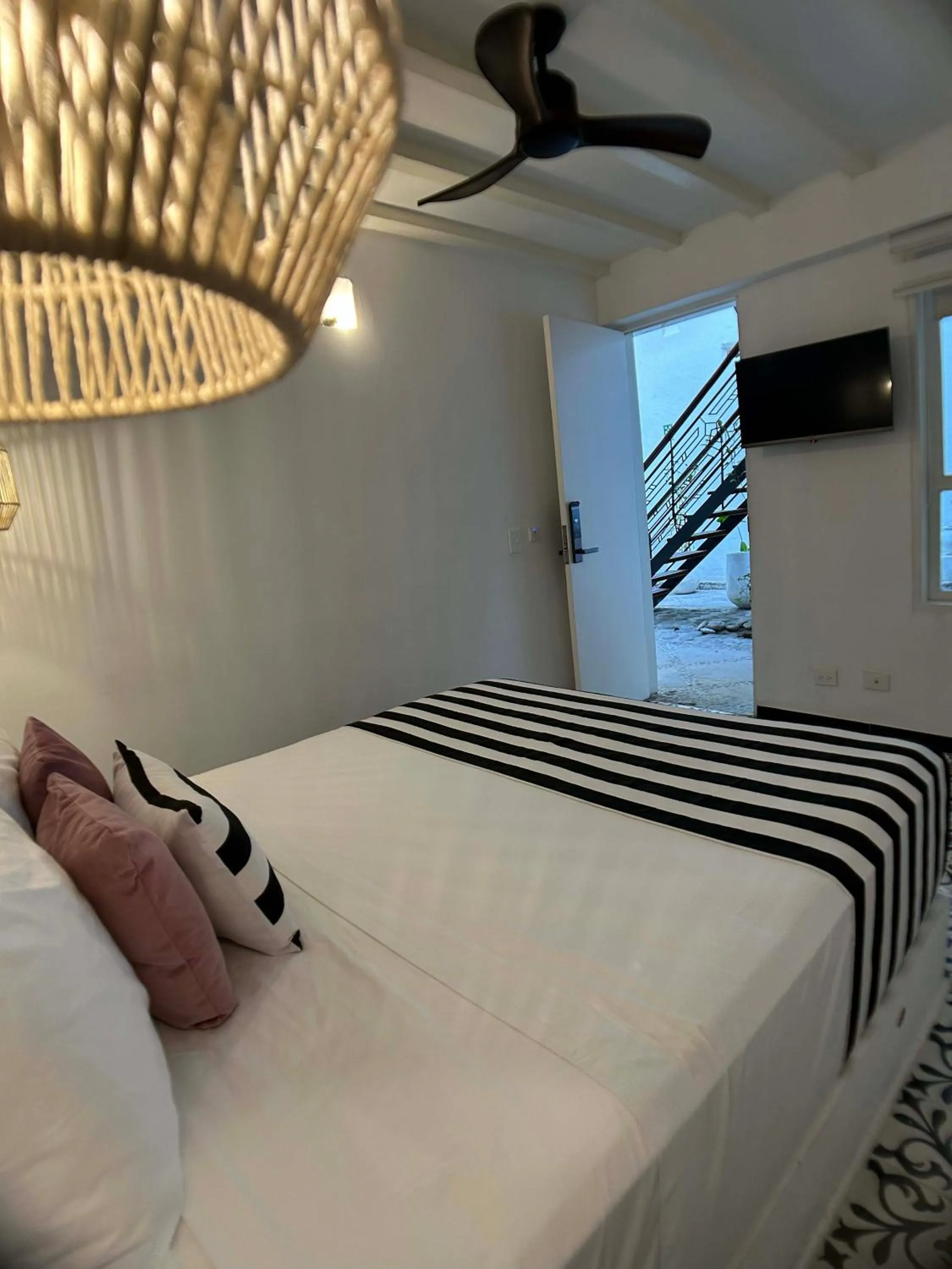 Bed in Casa Verde Boutique Hotel