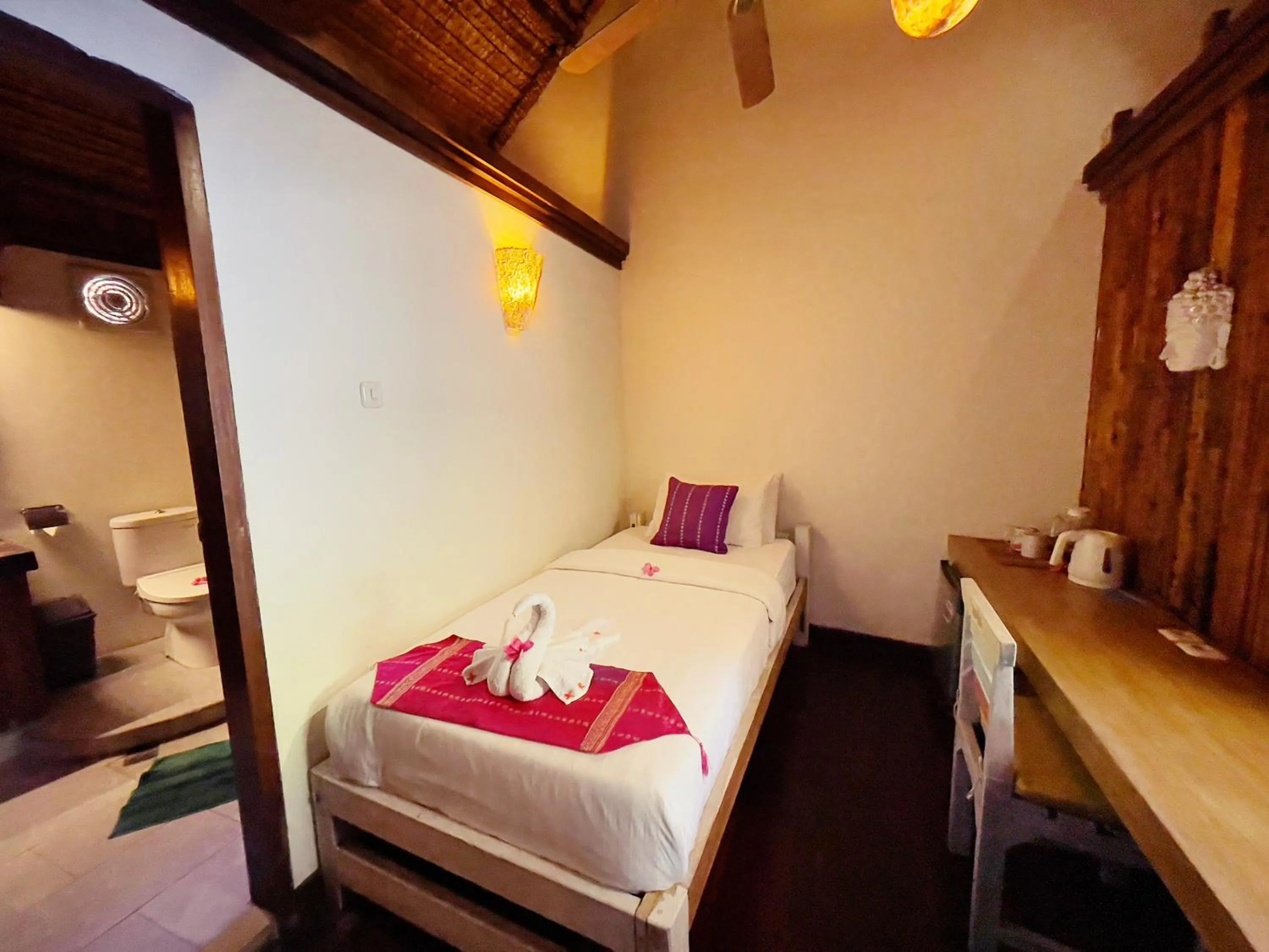 Bed in Samba Villas Beachfront View