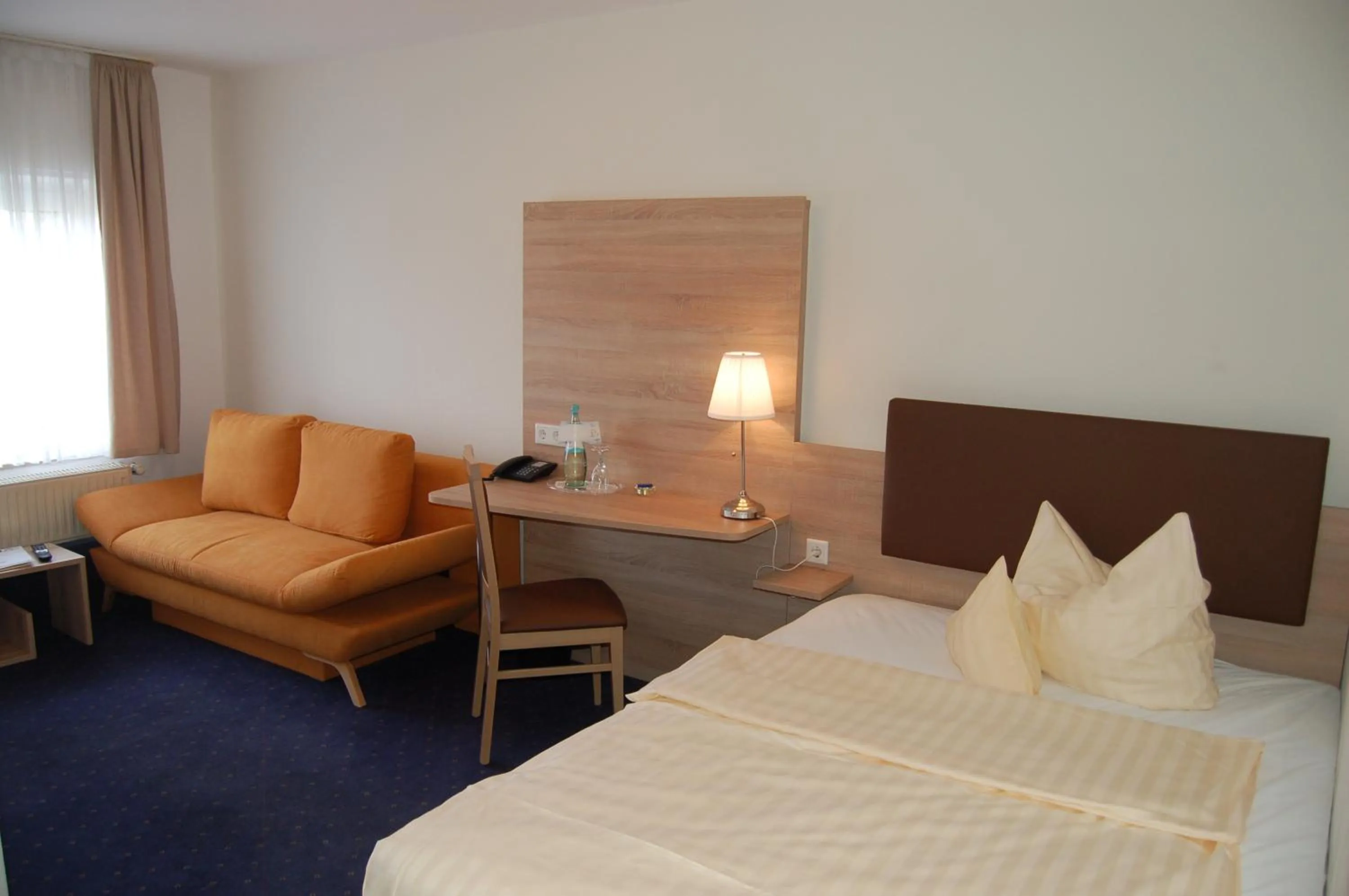 Photo of the whole room, Bed in Hotel-Restaurant Ammertmann