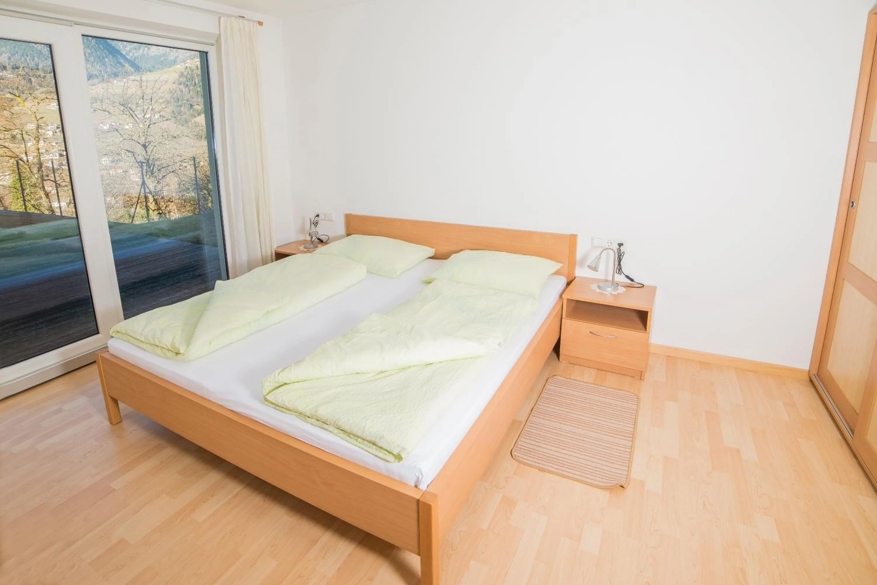 Photo of the whole room, Bed in Residence Fiegl