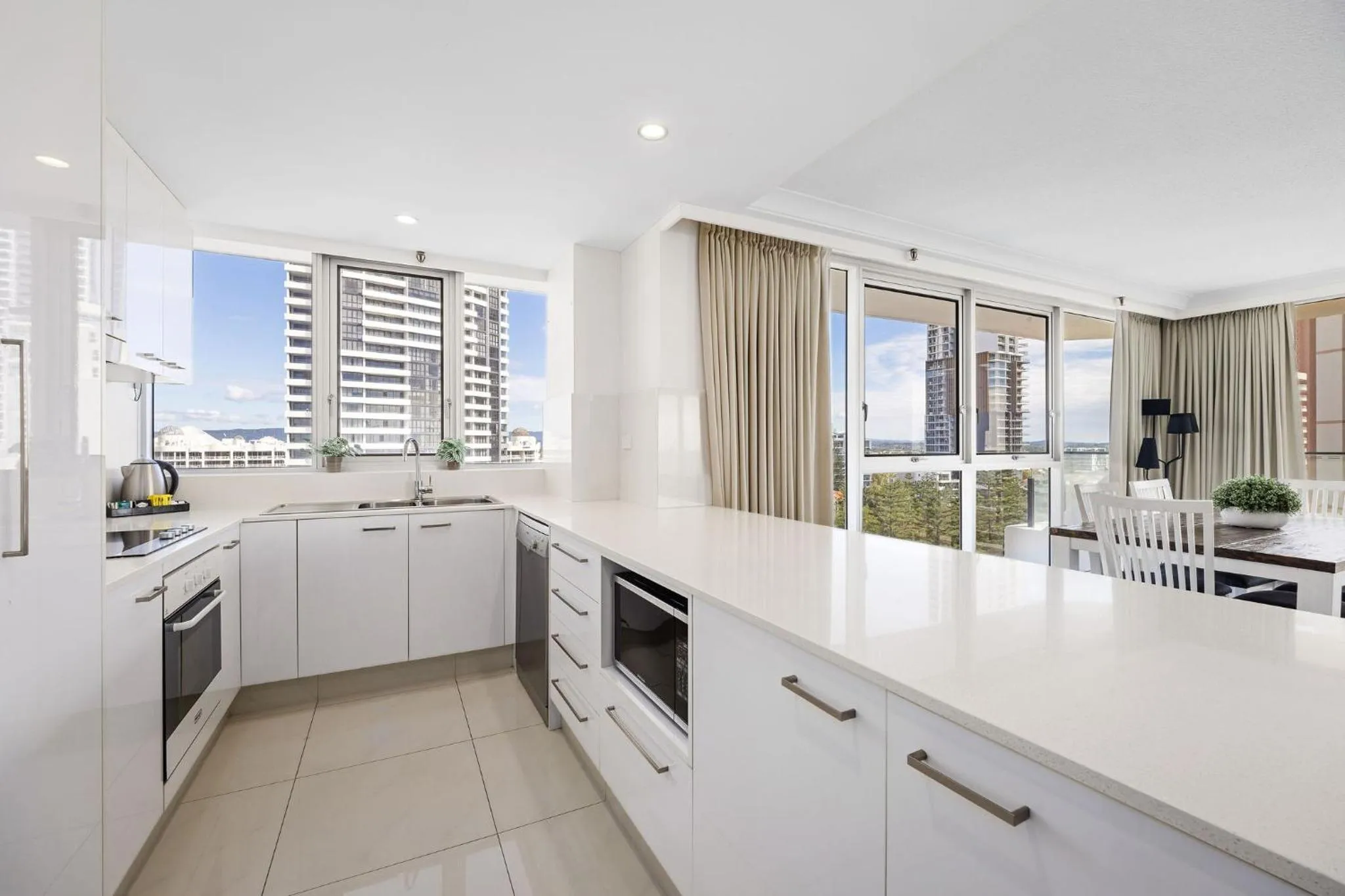 Kitchen or kitchenette in ULTIQA Beach Haven on Broadbeach