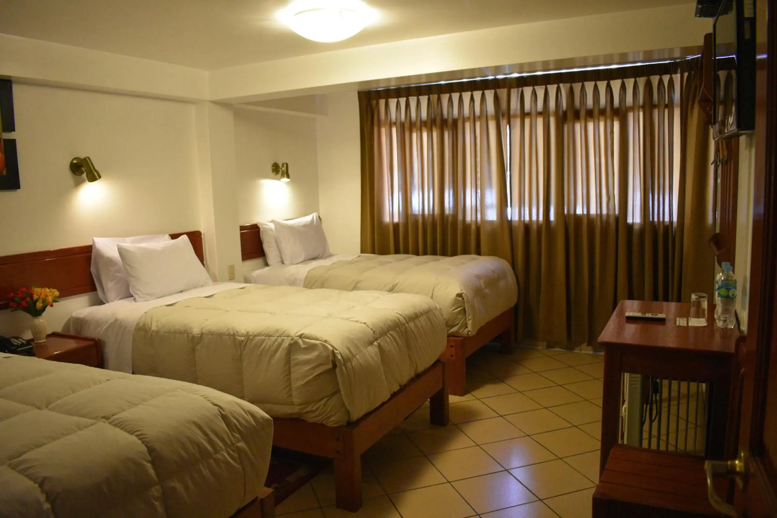 Classic Triple Room in Casa De Luz Hotel Classic Triple Room in Casa De Luz Hotel