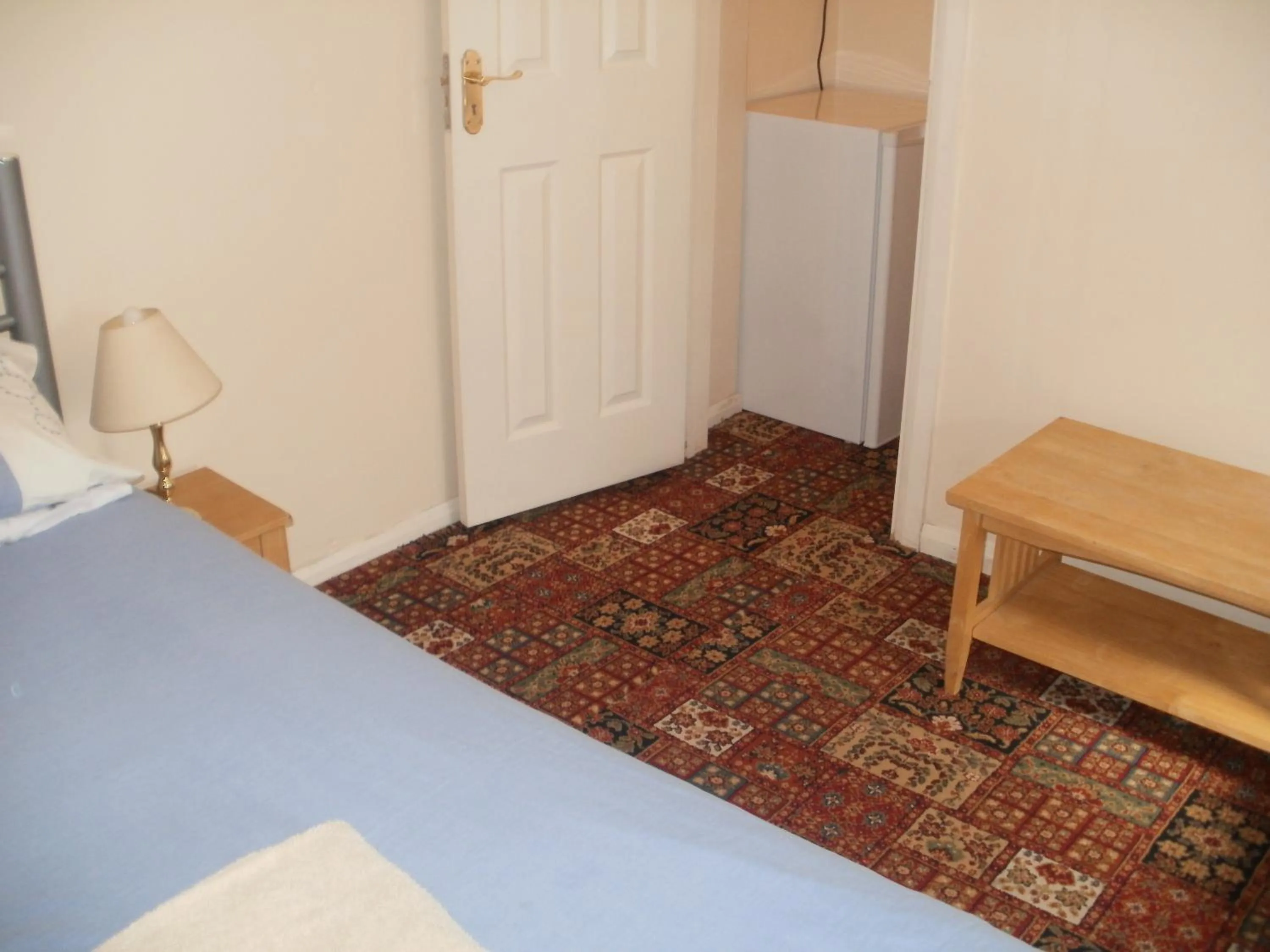 Decorative detail, Bed in London Heathrow Guesthouse