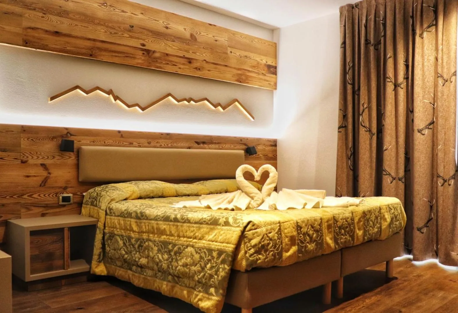 Bed in Hotel Panorama Wellness & Resort