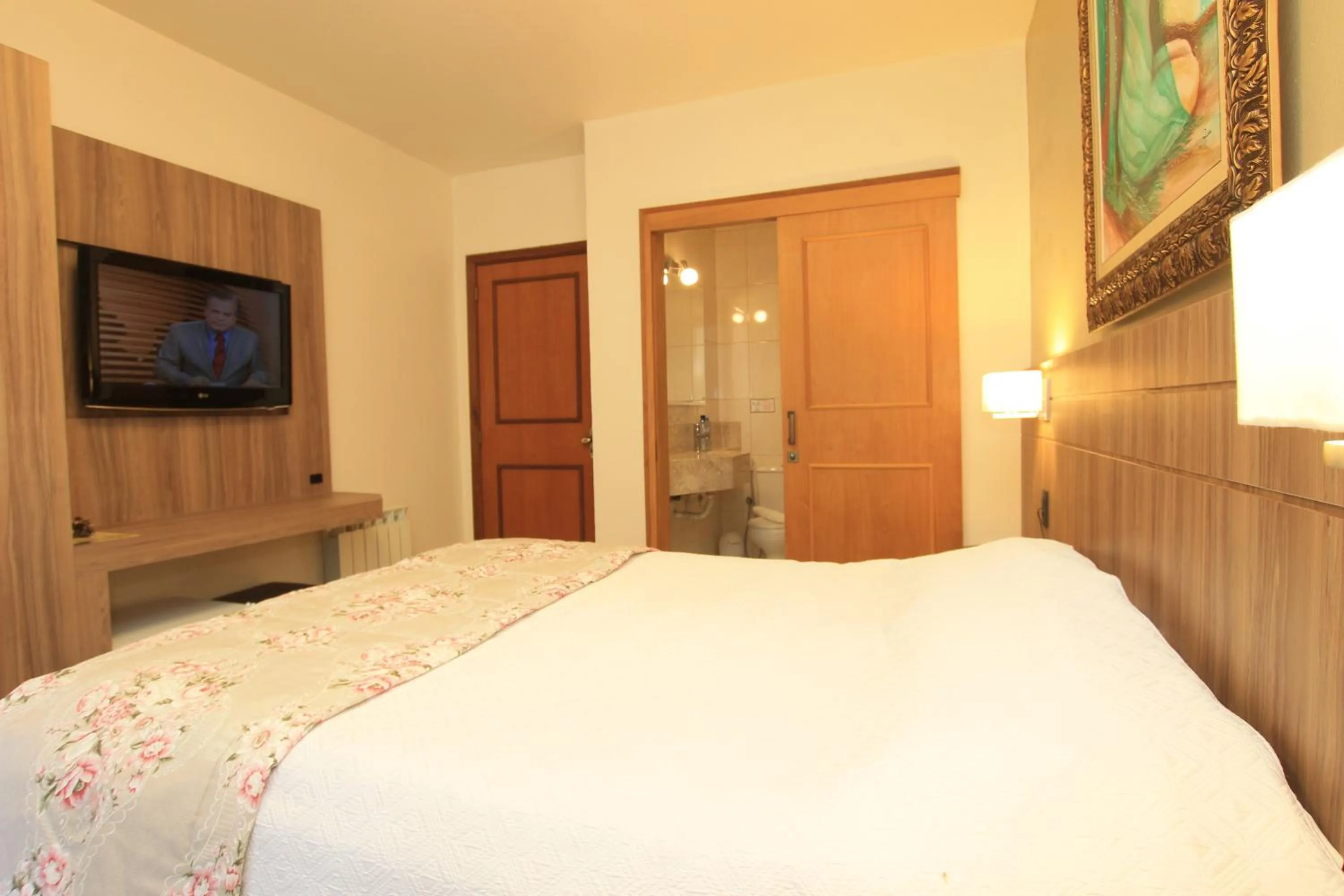 Bed in Pousada Águia Branca