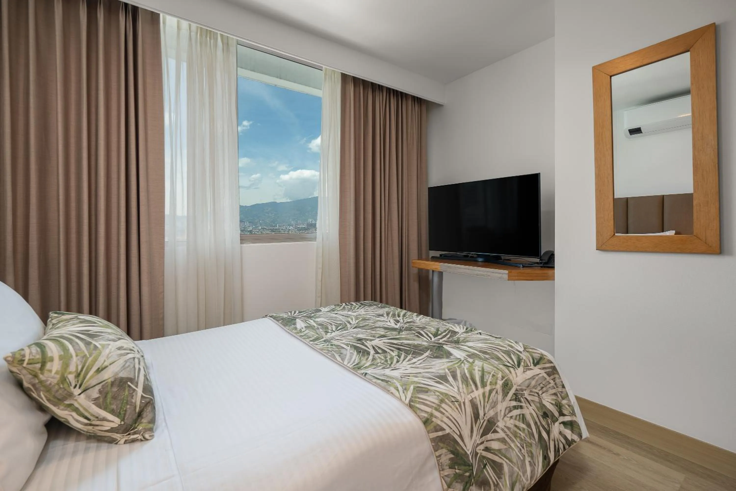 Bed in Affinity ApartaHotel - Extended Stay