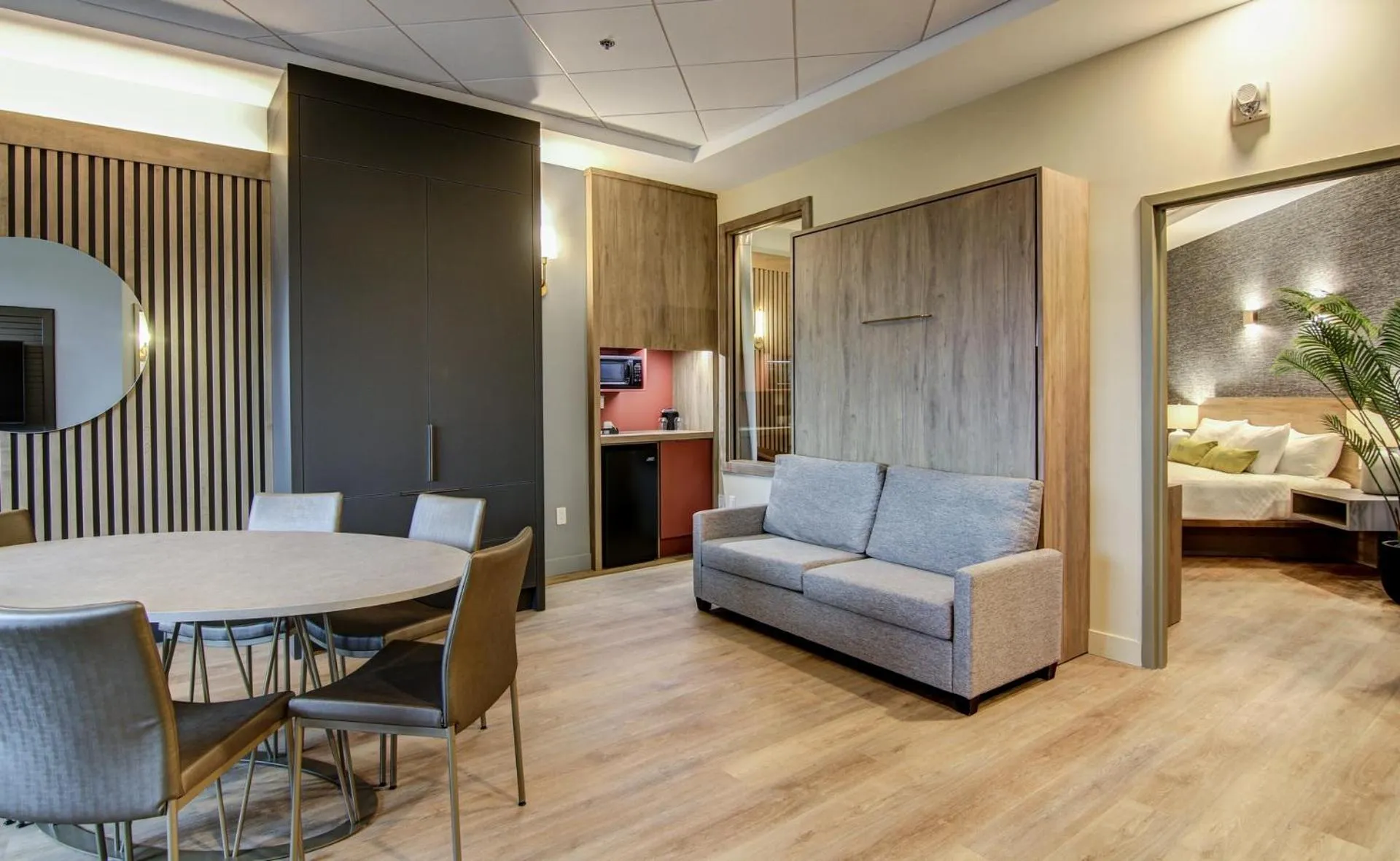 Living room, Bed in Hôtel du Jardin
