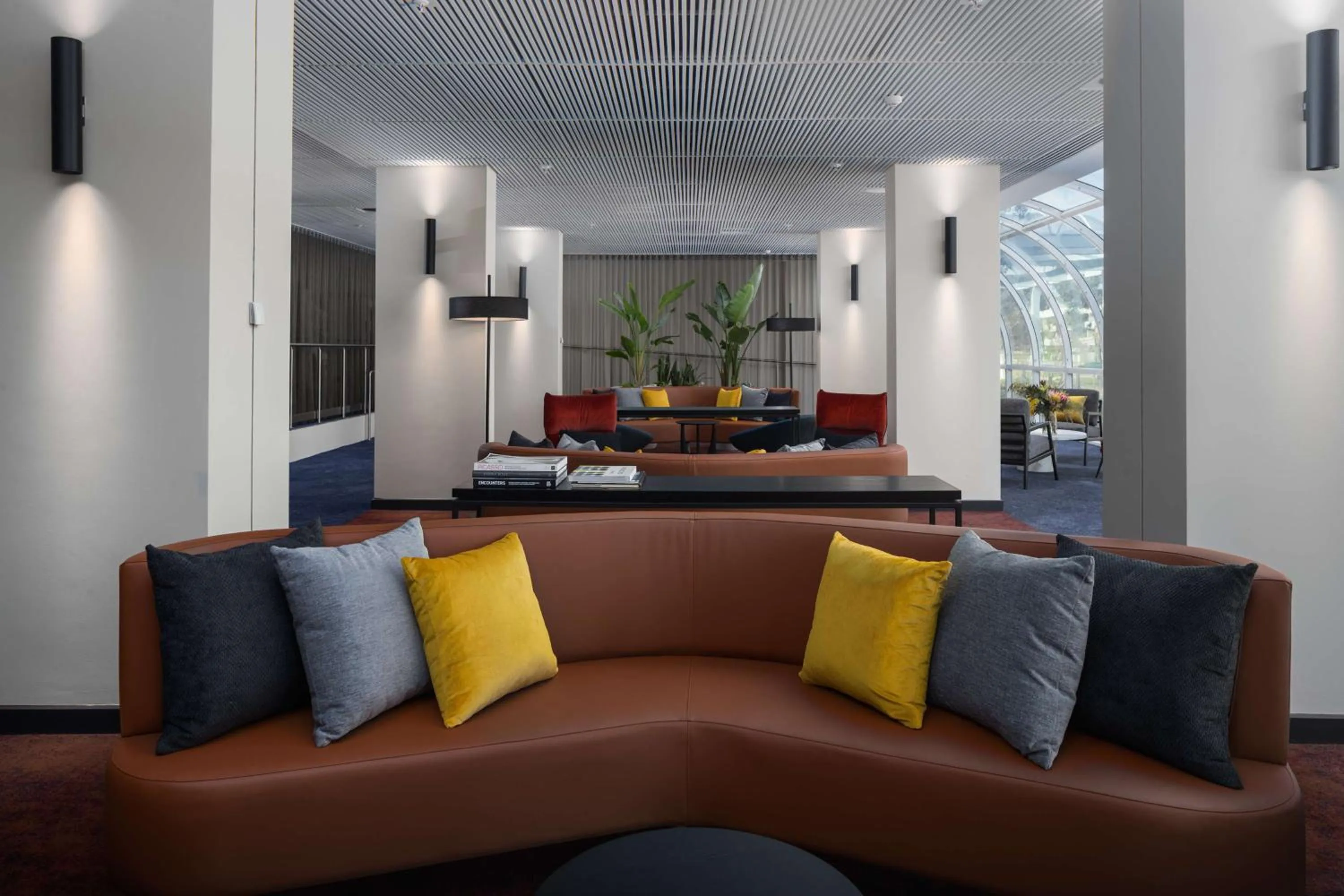 Lobby or reception in Rydges Canberra