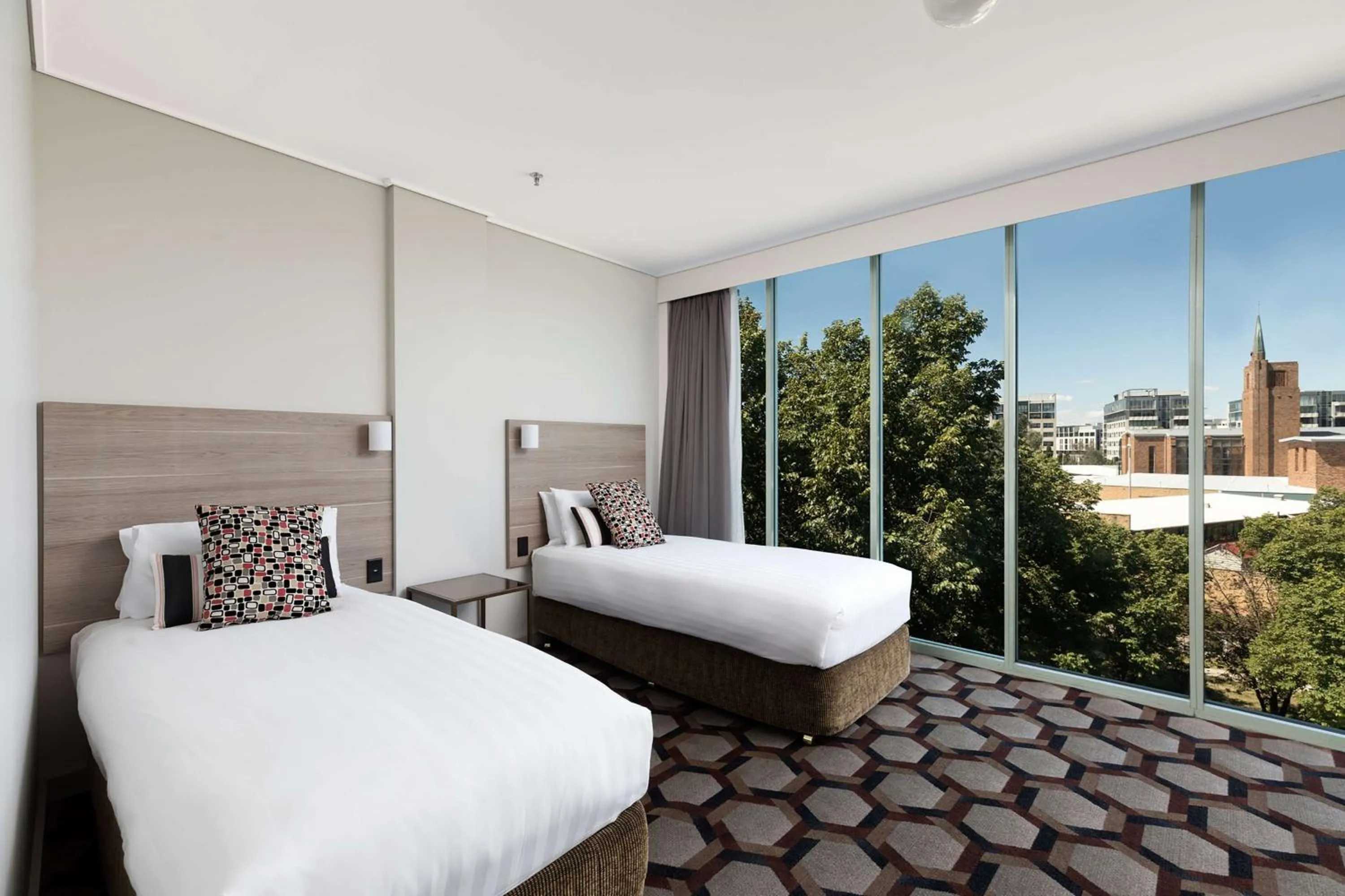 Photo of the whole room, Bed in Rydges Canberra