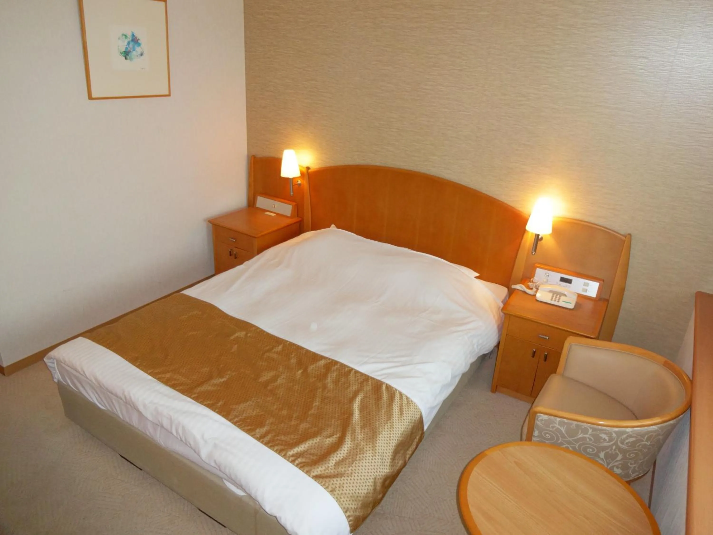 Bed in Kobe Luminous Hotel