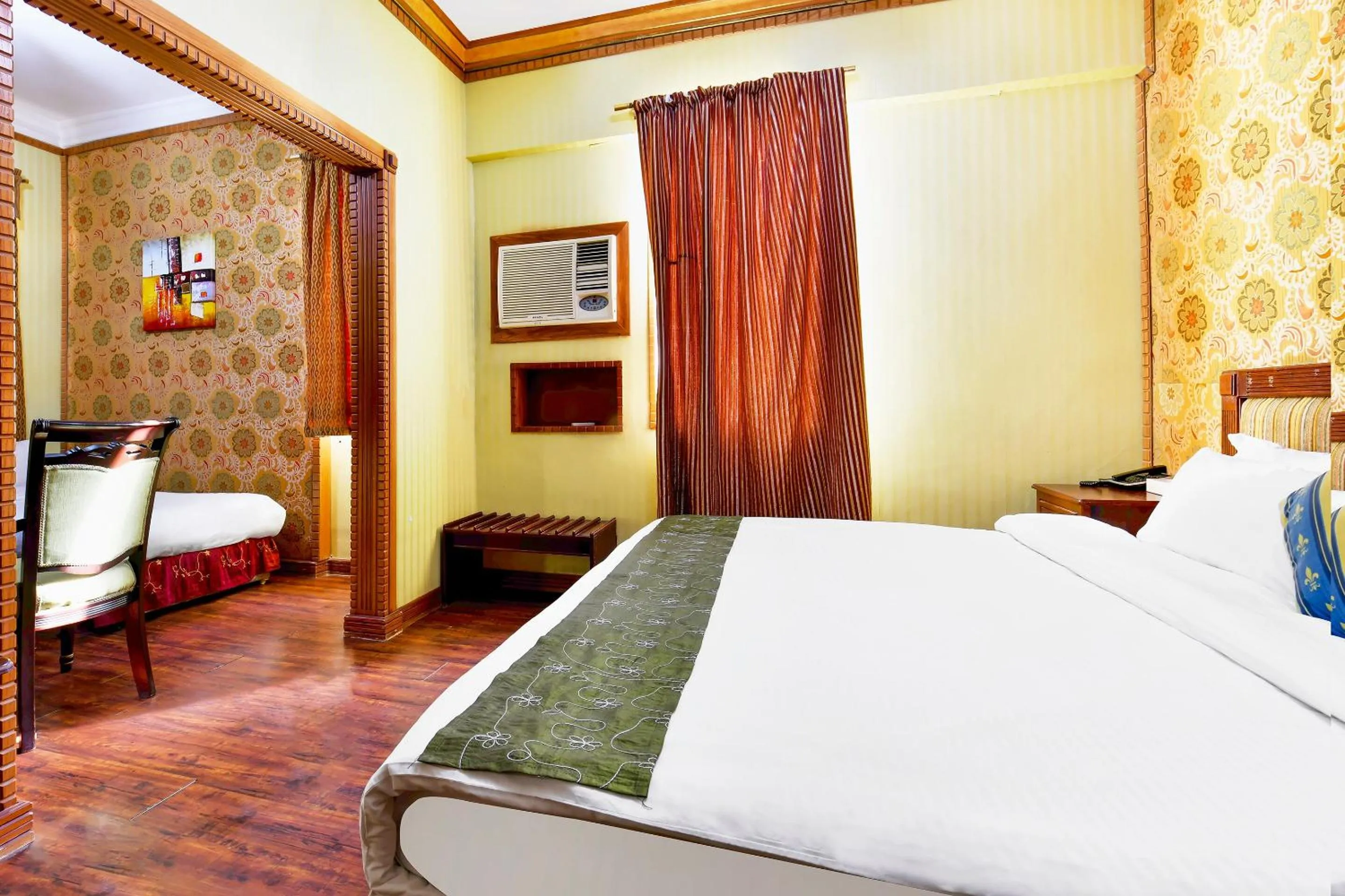 Bedroom, Bed in Capital O 125 Moon Plaza Hotel