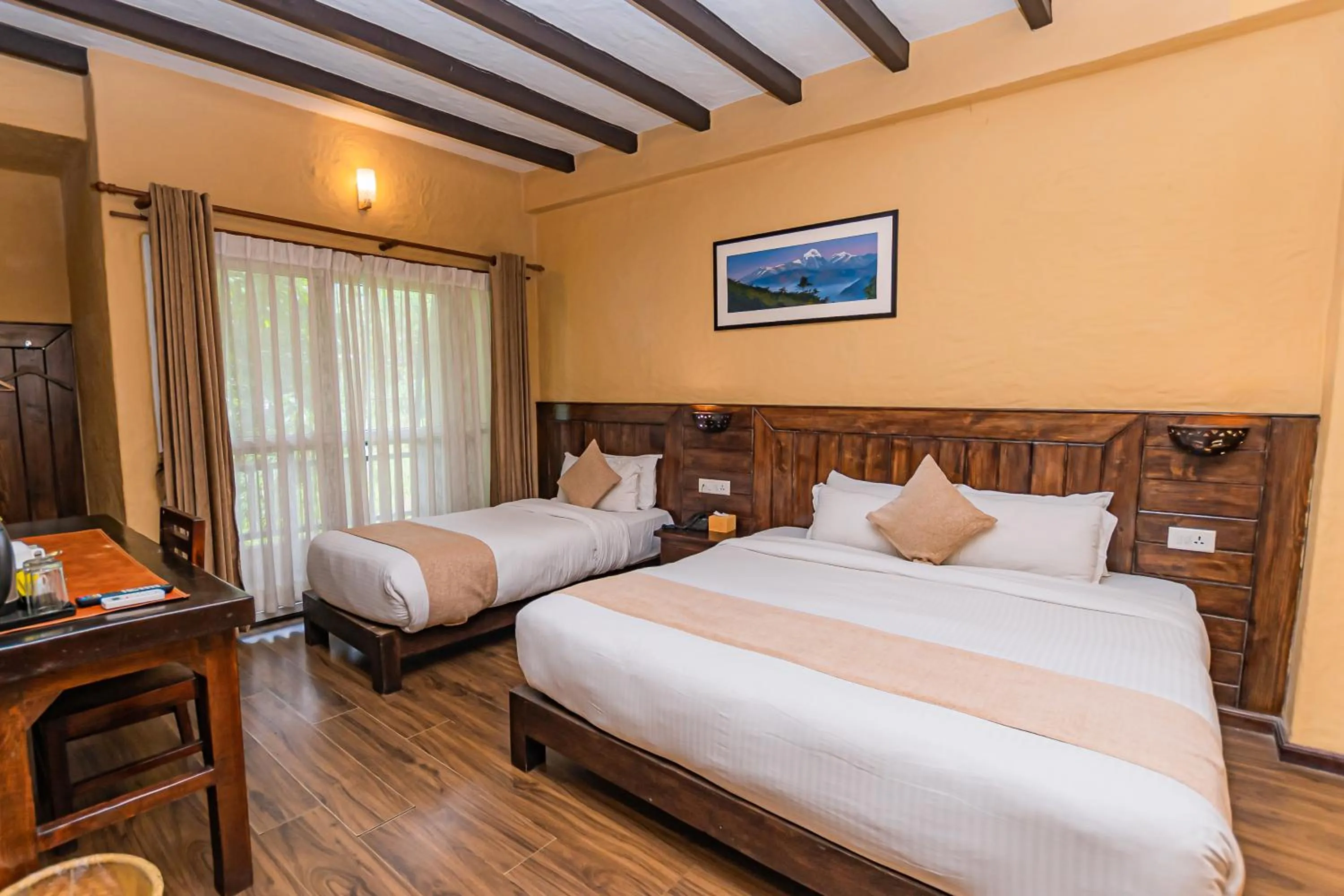 Bed in Pokhara Boutique Hotel