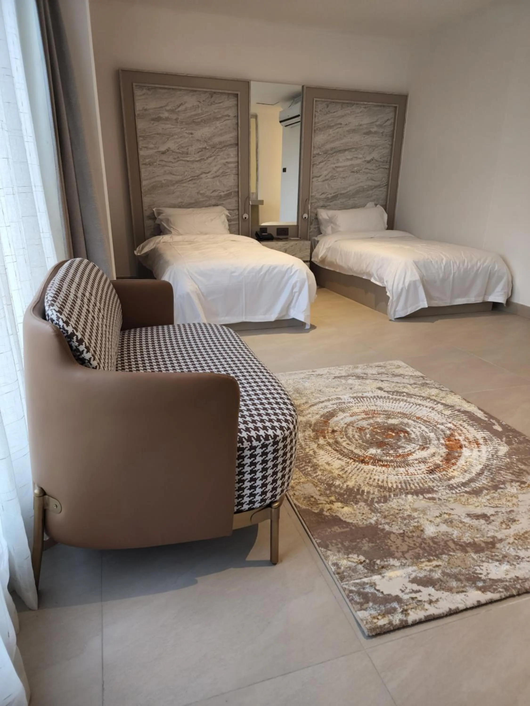 Bed in Imperial Suites Hotel