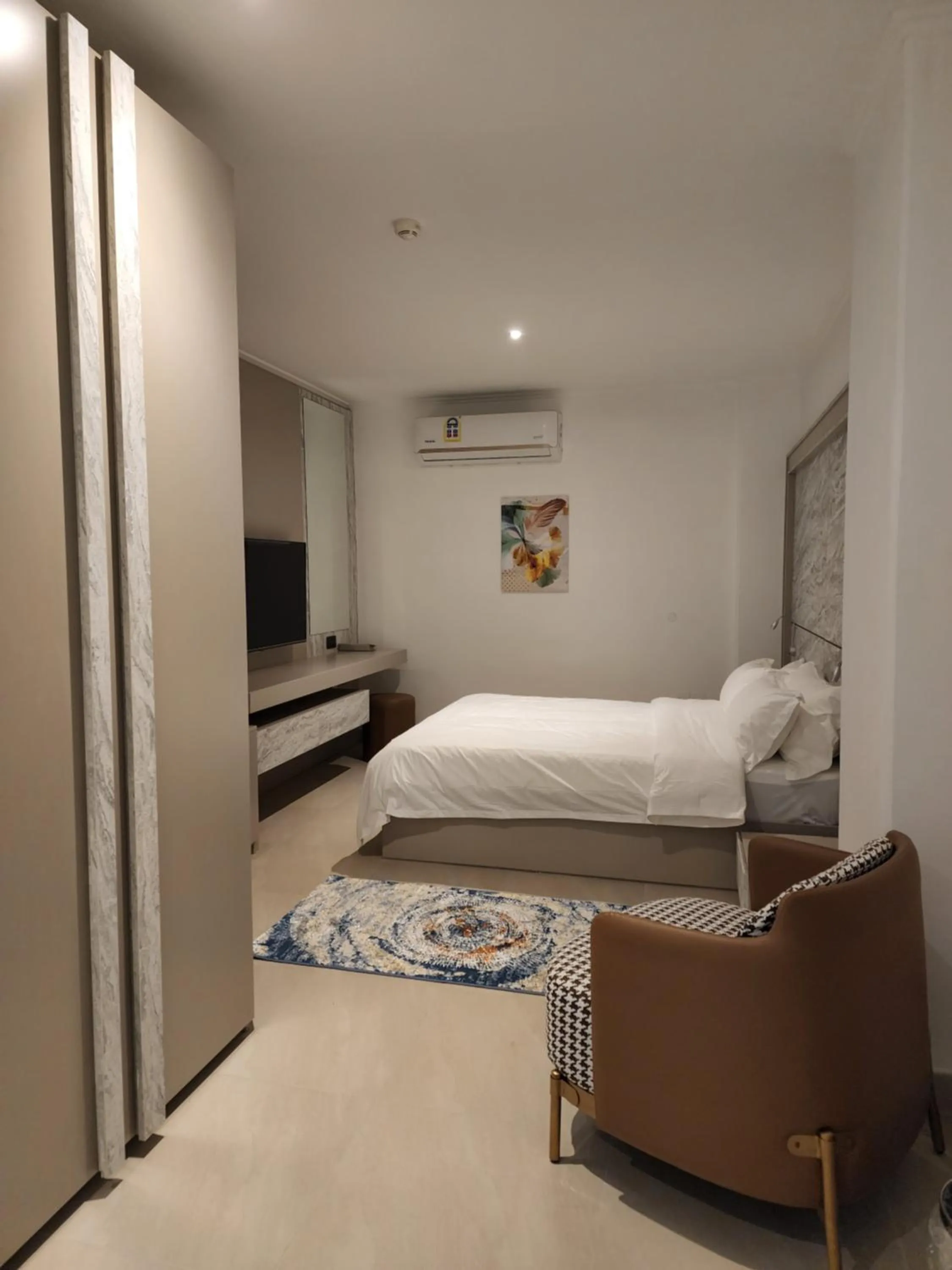 Bed in Imperial Suites Hotel