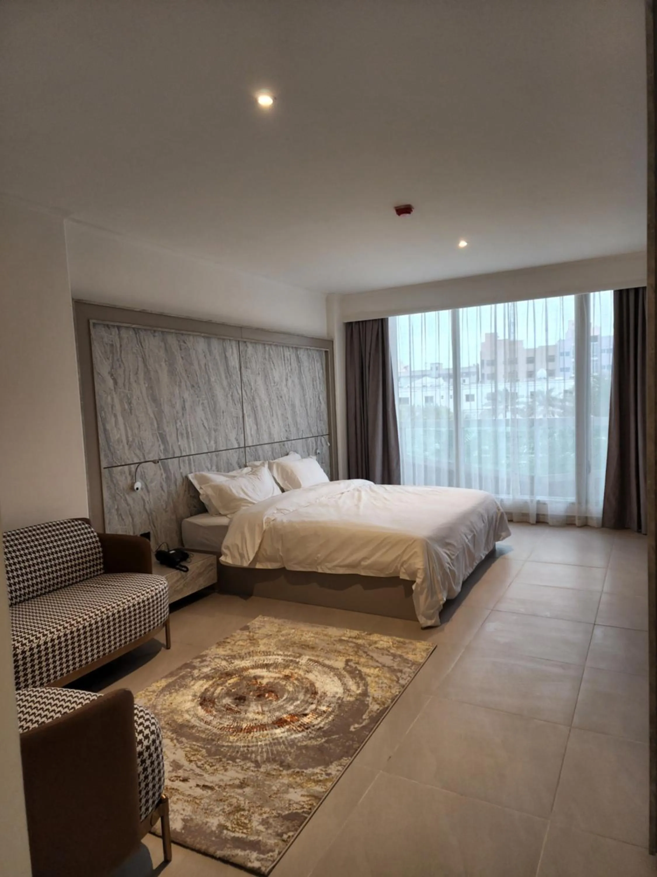 Photo of the whole room, Bed in Imperial Suites Hotel