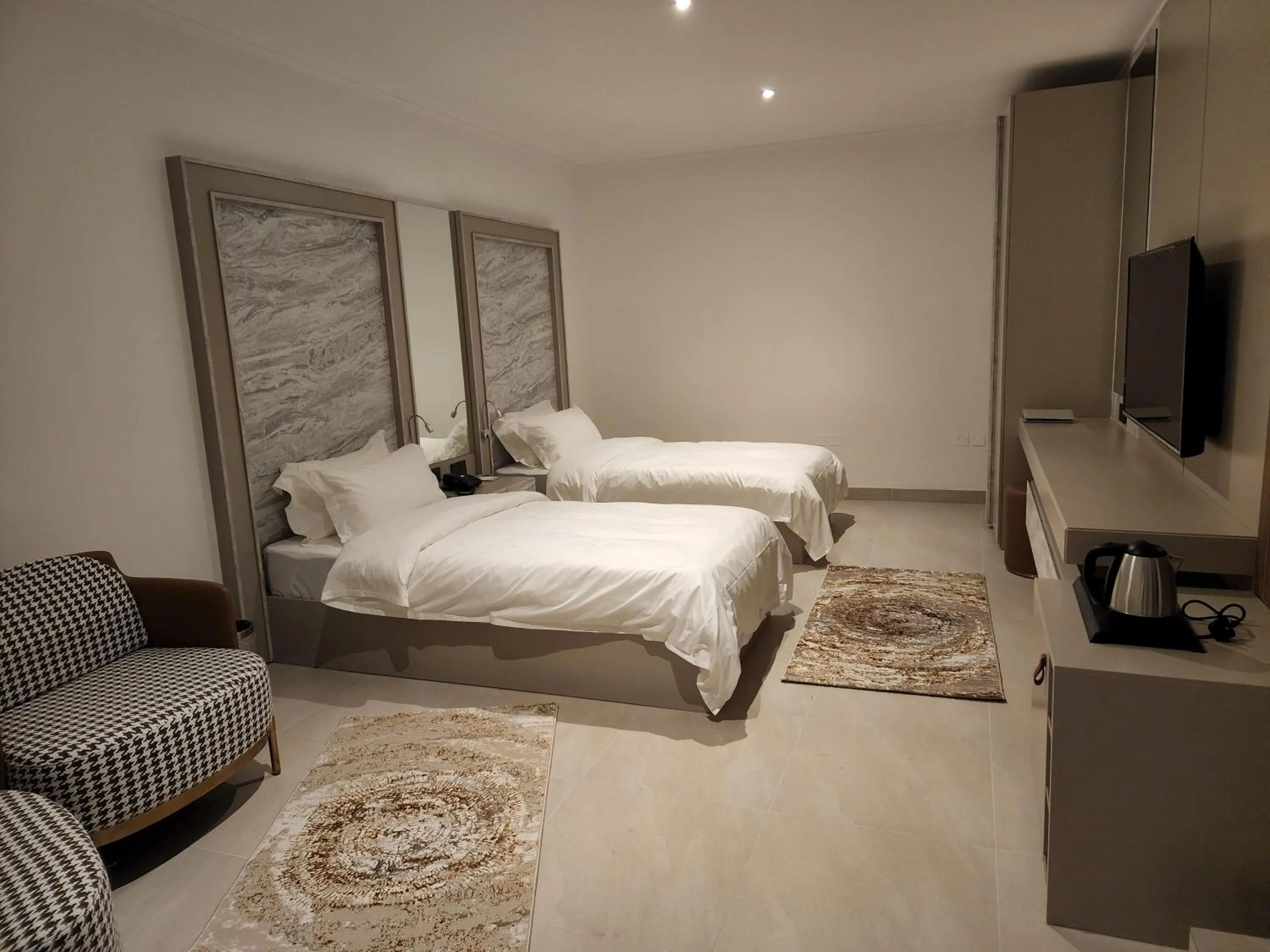 Bed in Imperial Suites Hotel