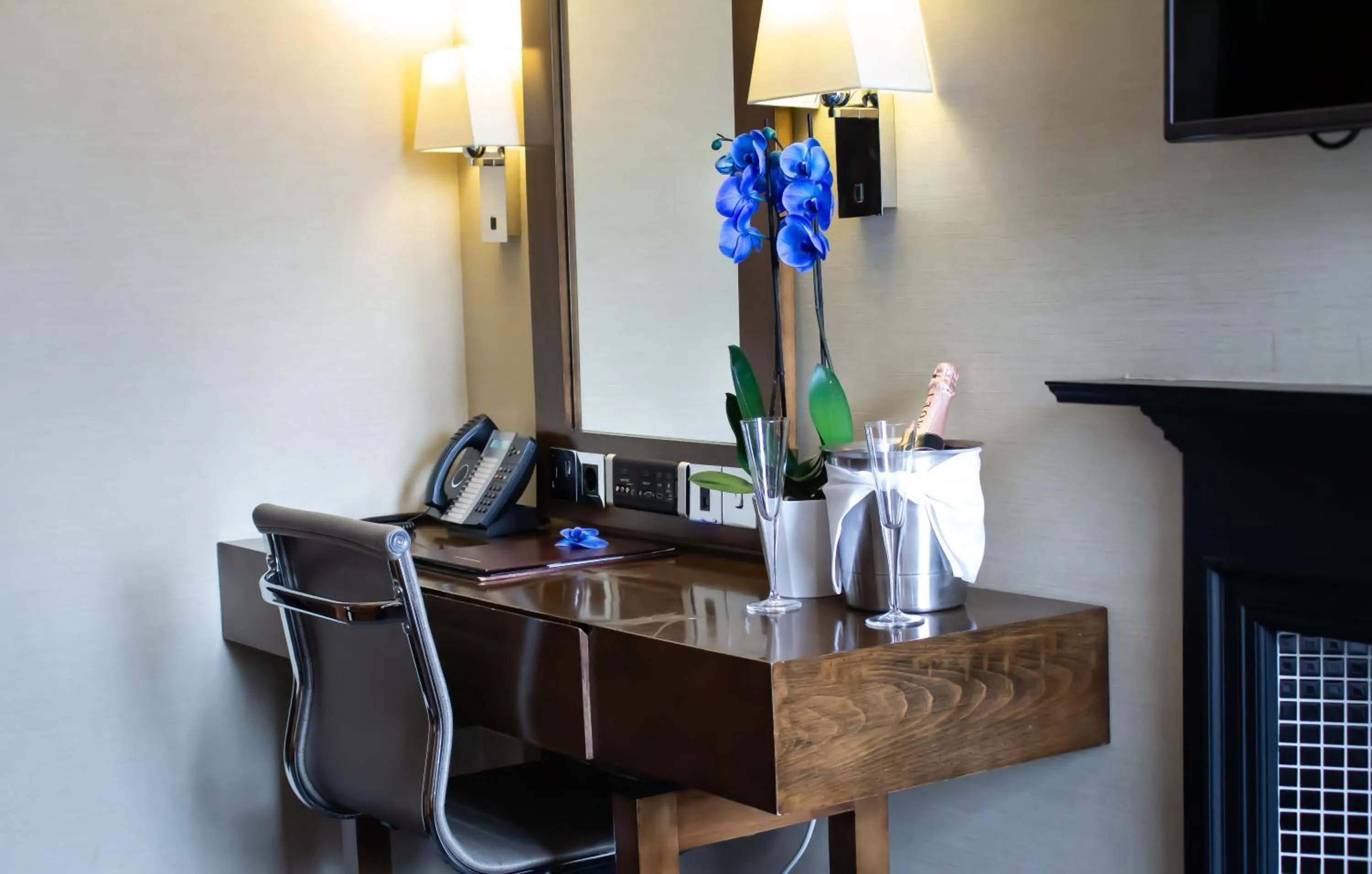 Seating area in Rochester Hotel by Blue Orchid