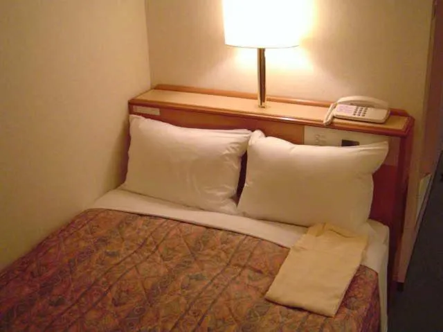 Bed in Hashimoto Park Hotel
