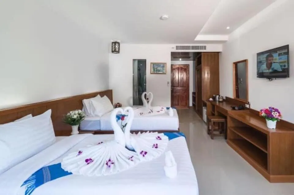 Bed in Baan Vanida Garden Resort