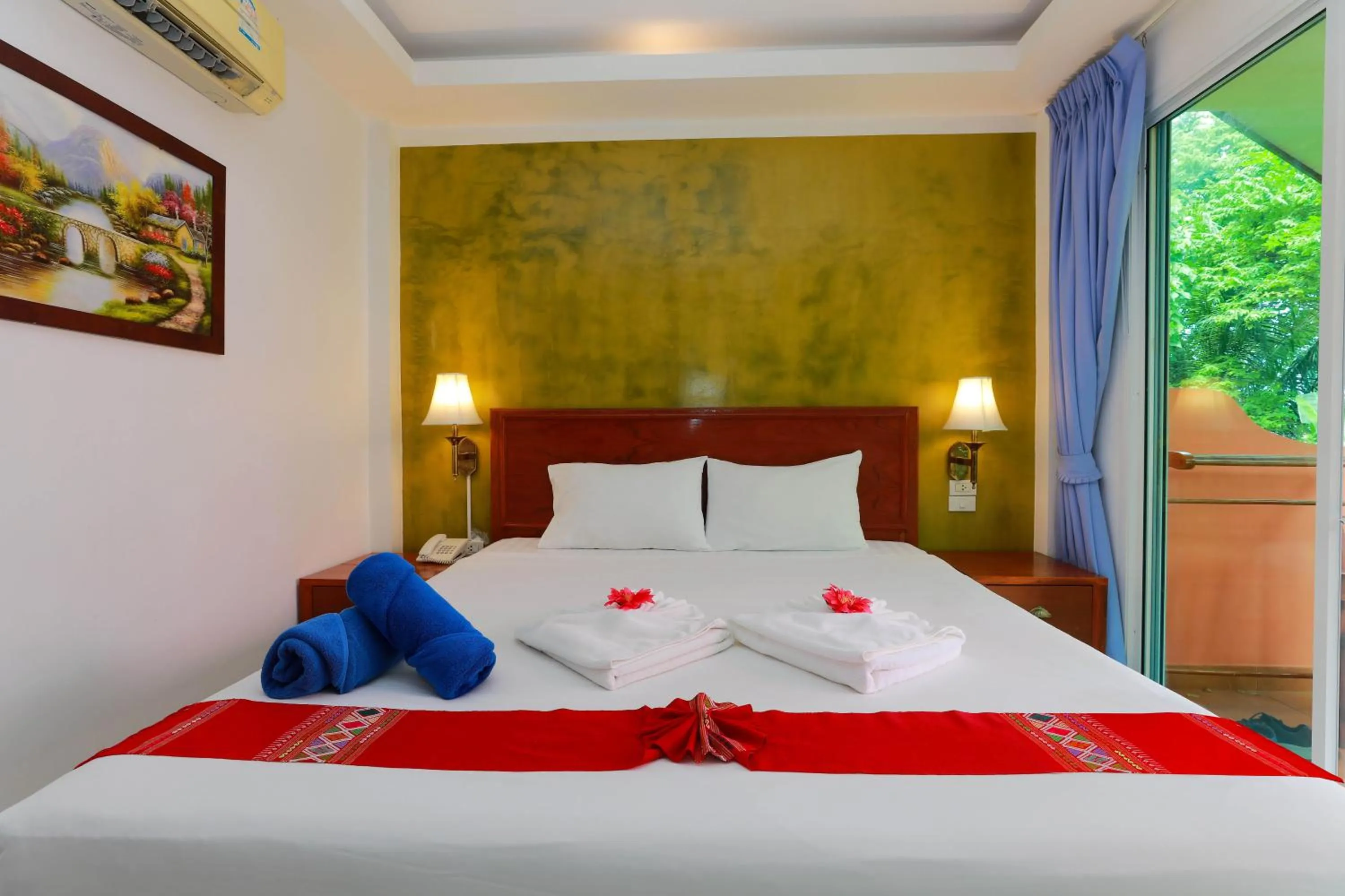 Bed in Baan Vanida Garden Resort