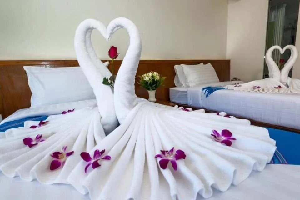 Bed in Baan Vanida Garden Resort