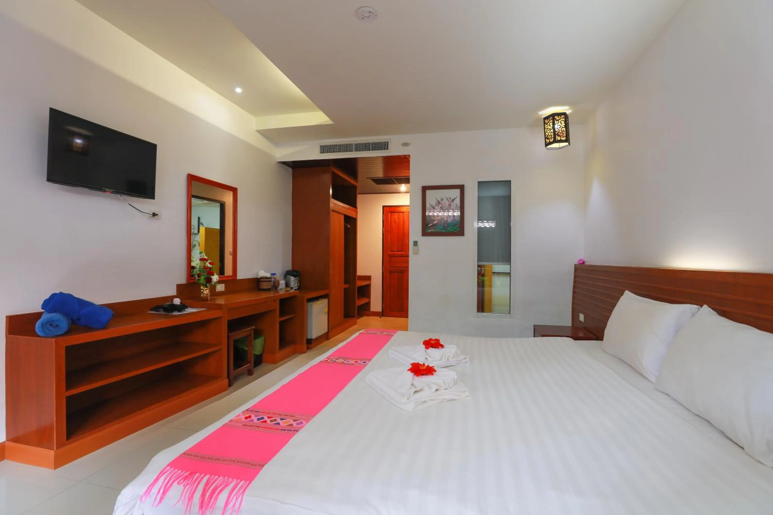 Bed in Baan Vanida Garden Resort