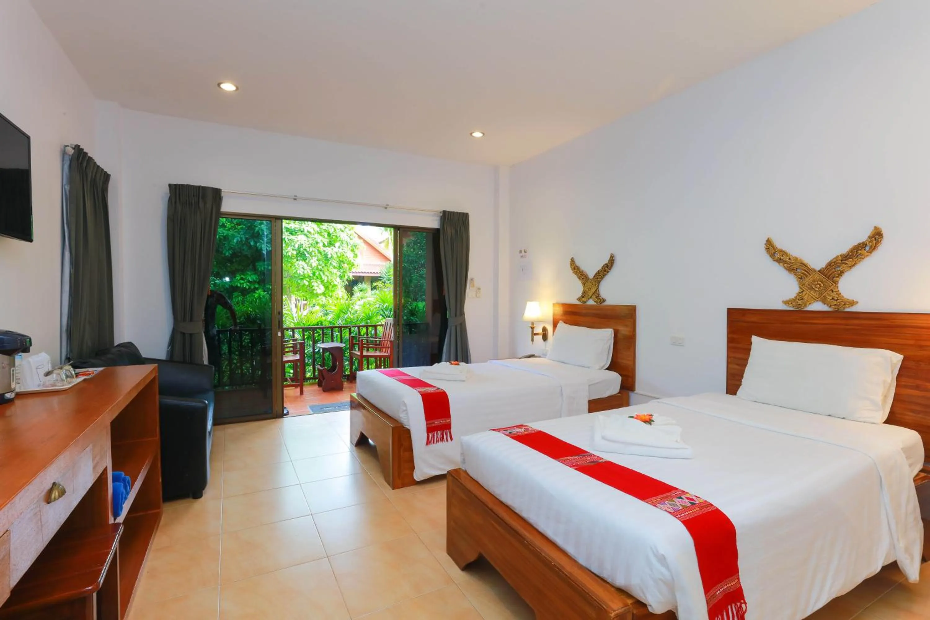 Bed in Baan Vanida Garden Resort