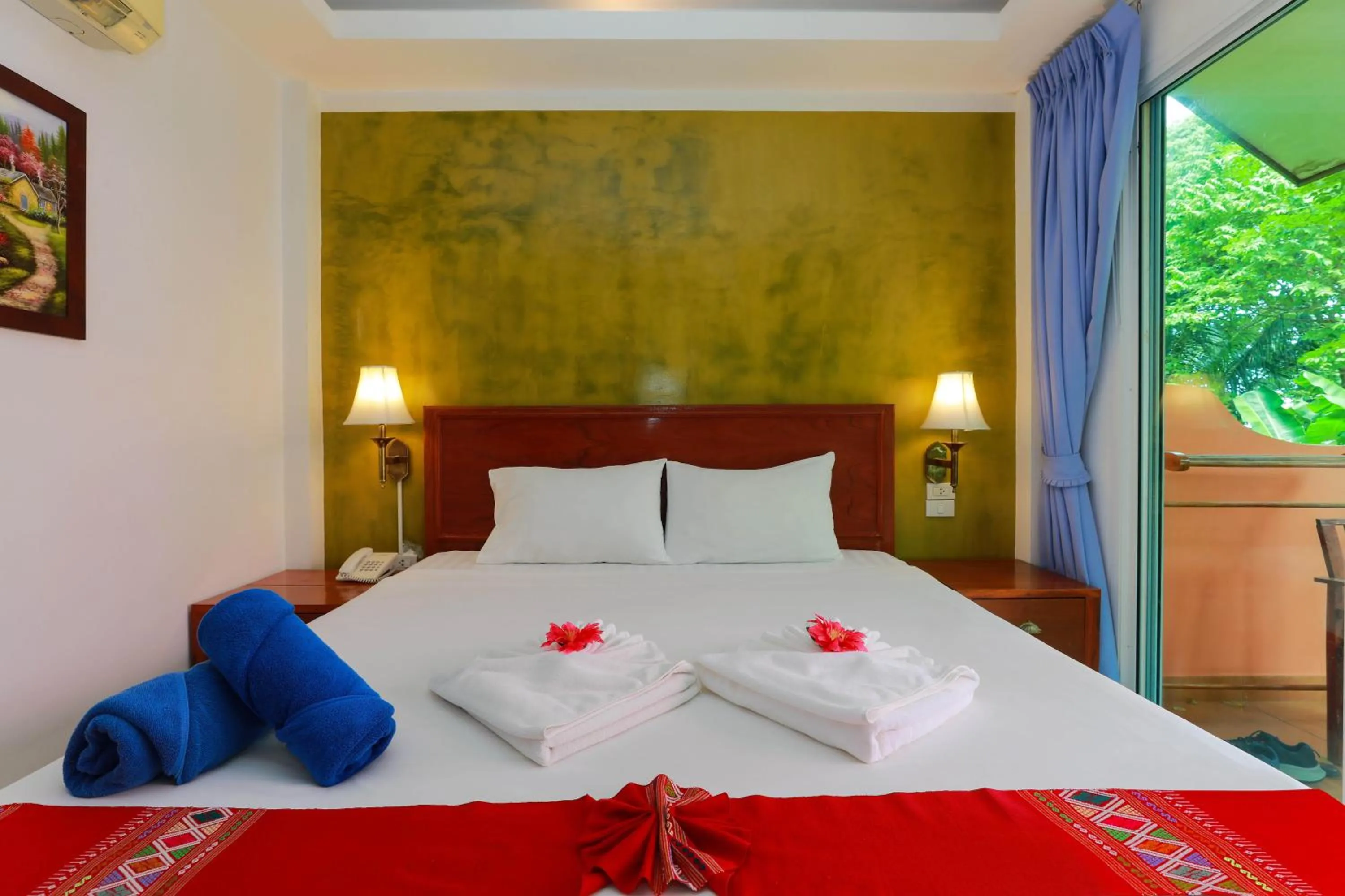 Bed in Baan Vanida Garden Resort