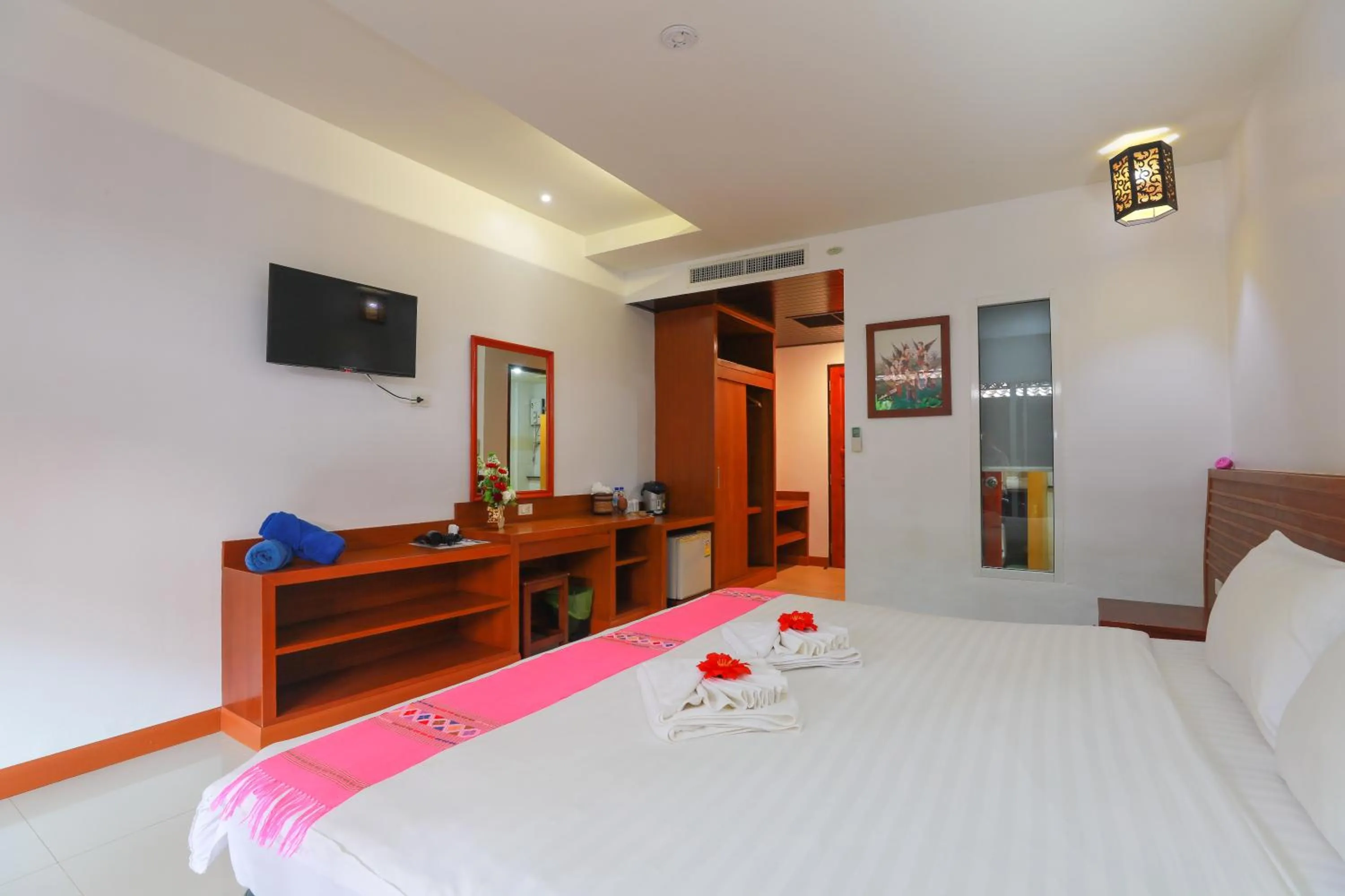 Bed in Baan Vanida Garden Resort