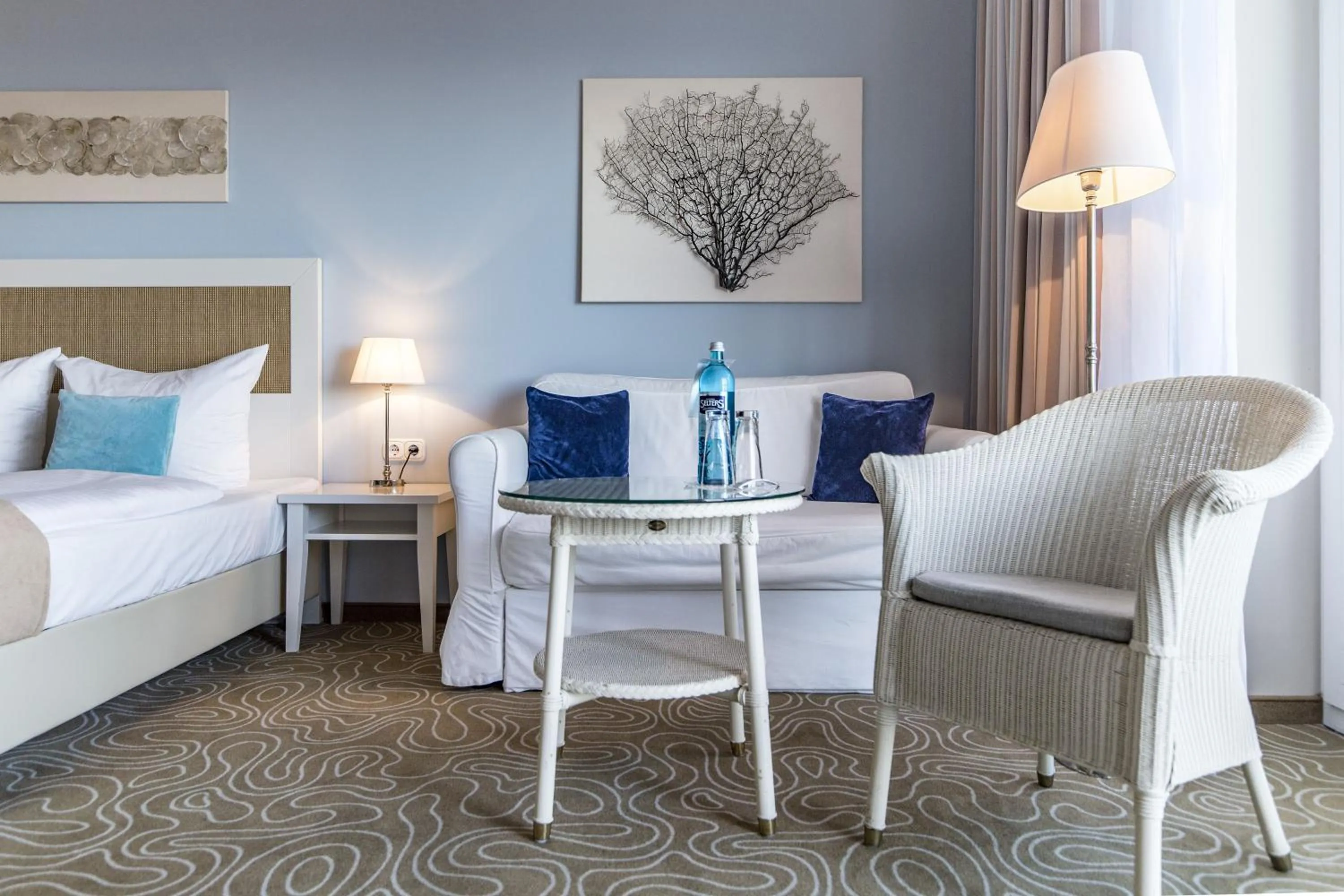 Seating area, Bed in Mein Strandhaus - Hotel, Restaurant & Schwimmbad