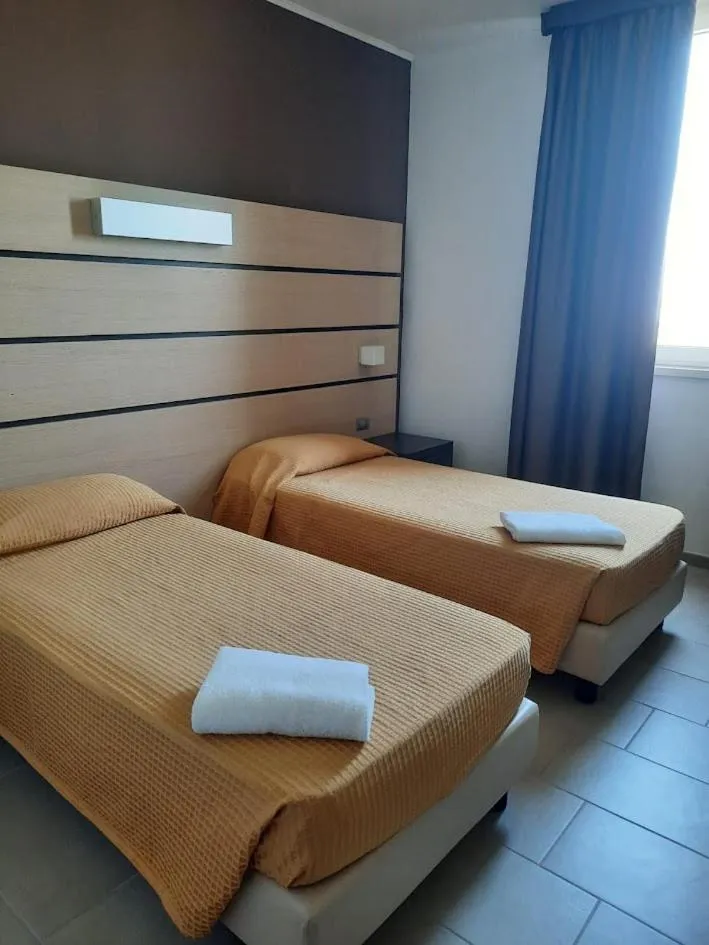 Bed in Hotel Verdina