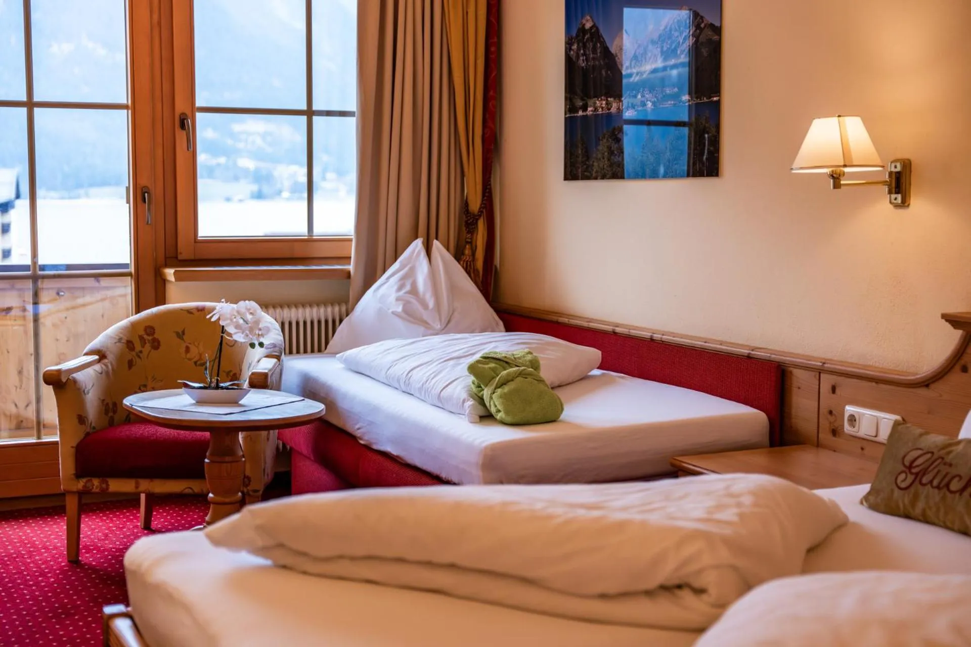 Bed in Liebes Caroline 4-Sterne-Hotel