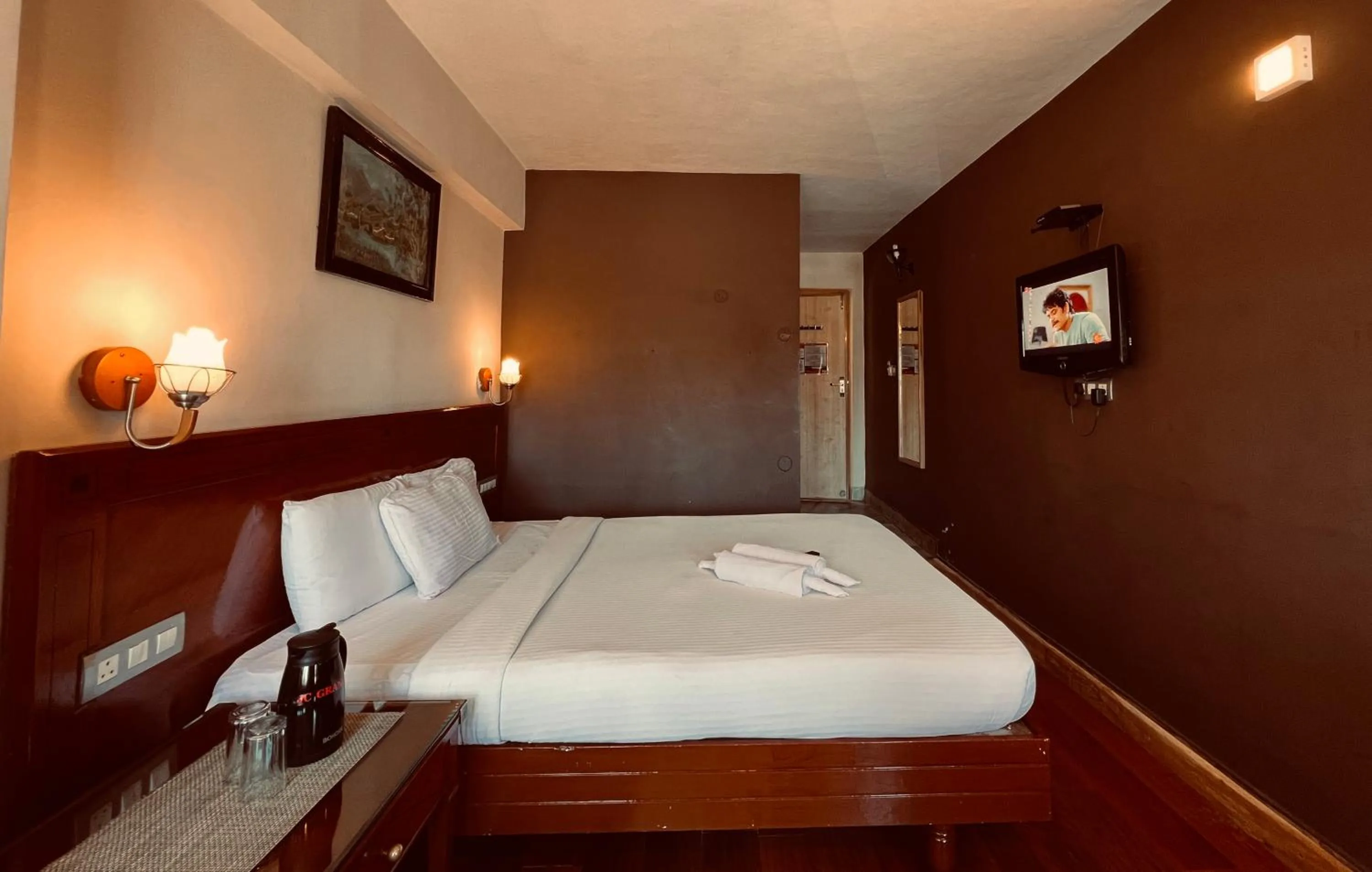 Bed in Hotel Jc Grand